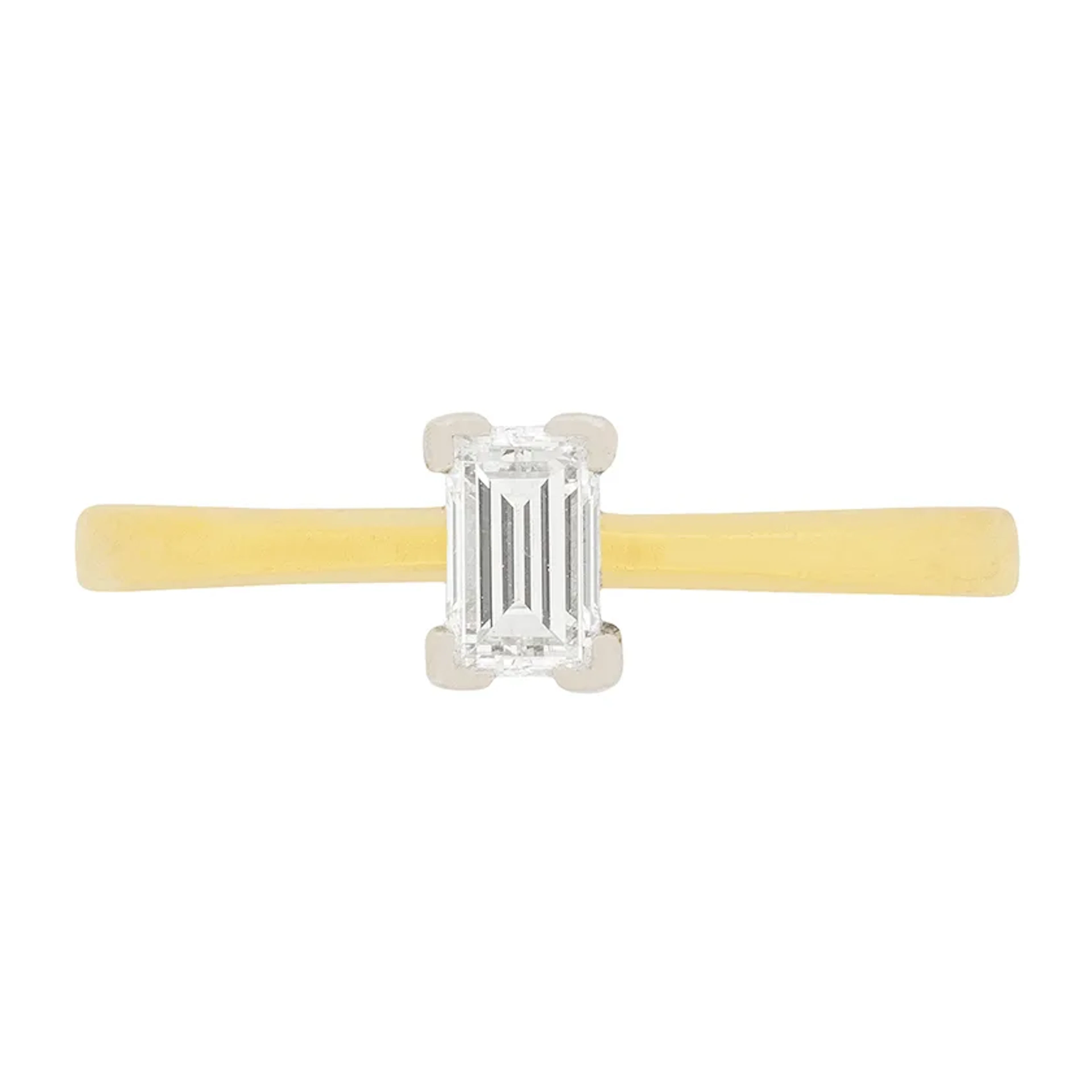 Contemporary 0.25ct Emerald Cut Diamond Solitaire Engagement Ring