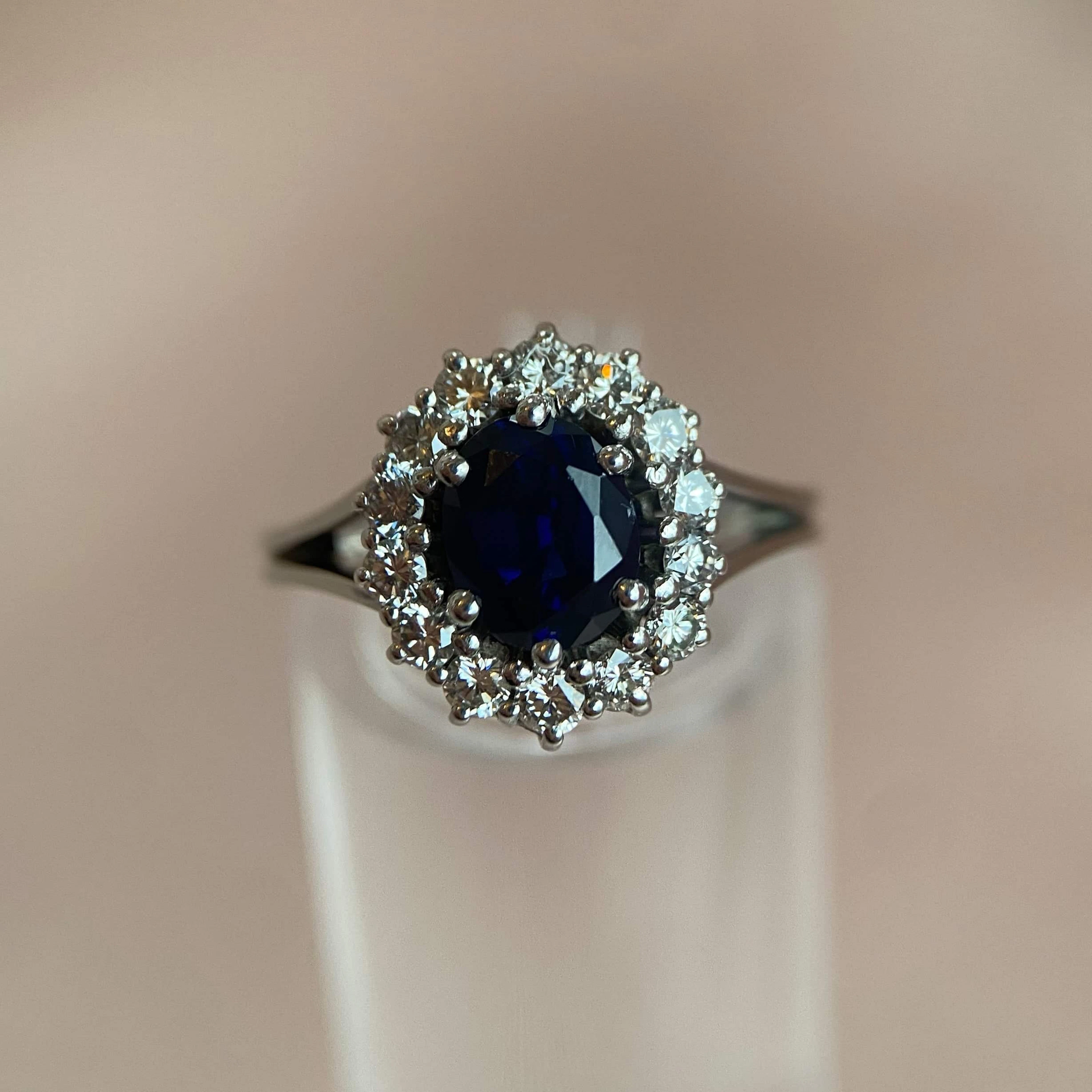 White gold ring with dark blue sapphire and diamonds (2000–2010)