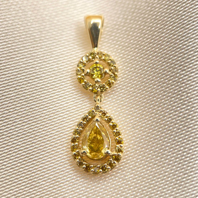 Gold pendant with 0.36 ct fancy yellow diamond: “Drop of Honey”