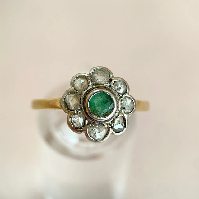Emerald in vintage shine ring: “Spring Flower”