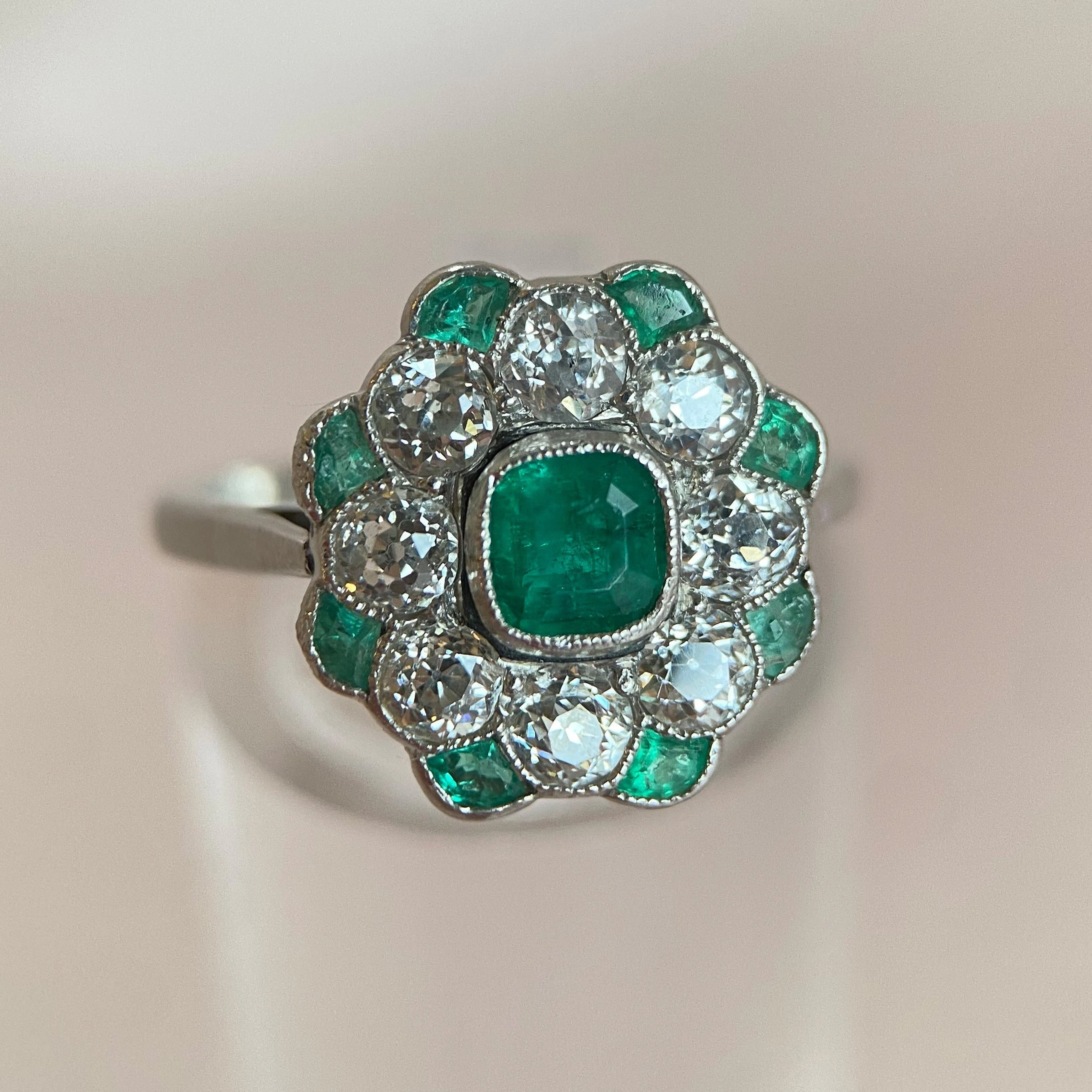 Platinum ring with emeralds and diamonds: “Spring Fever”