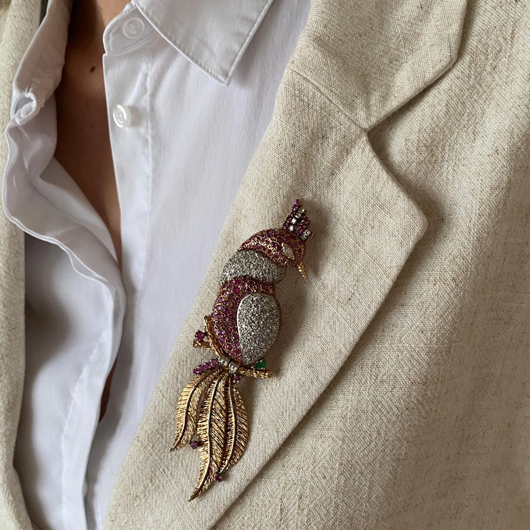 Huge solid gold brooch with “iced out” diamond and ruby setting: “Birds