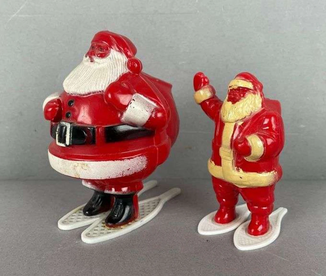 Group of 2 Vintage Plastic Snowshoe Santas
