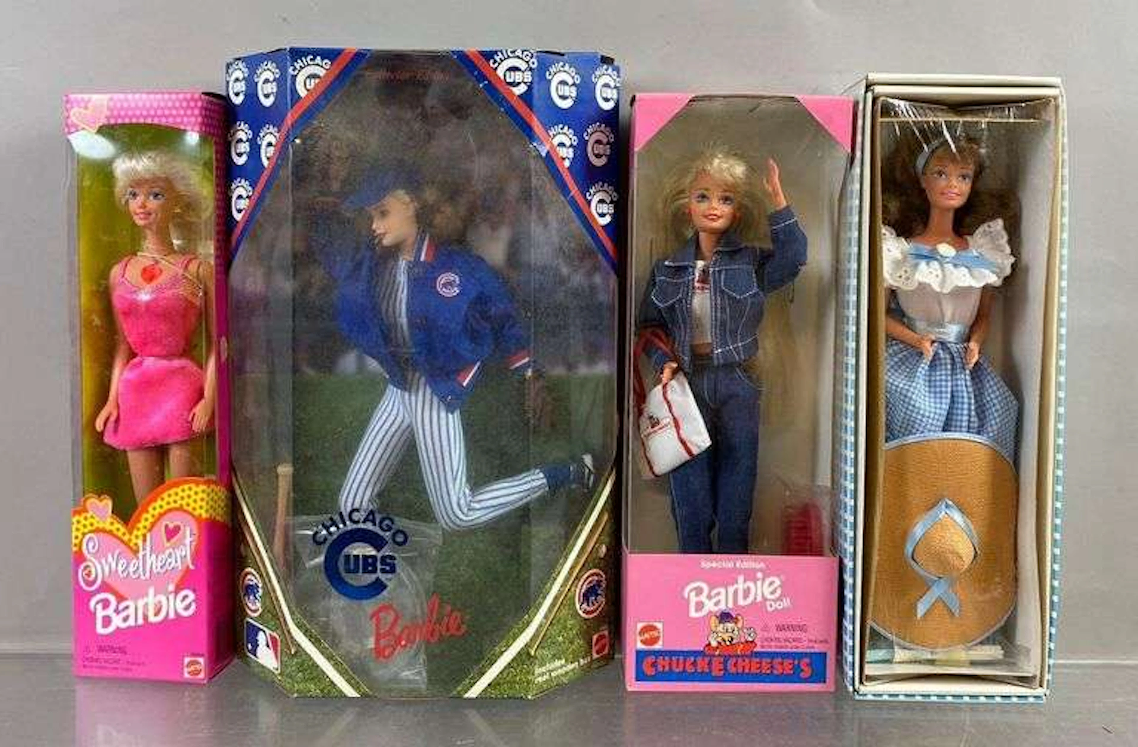 Group of 4 Mattel Barbie Fashion Dolls