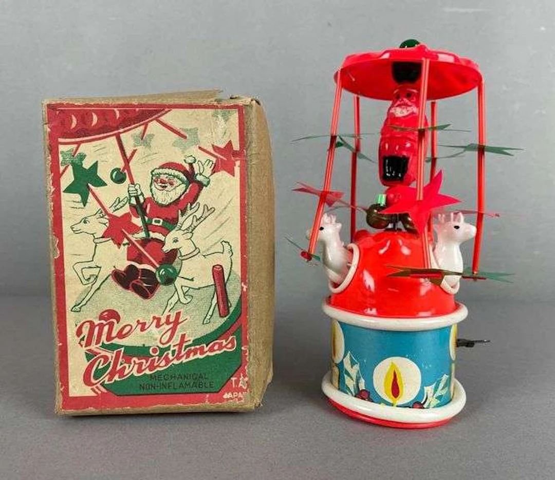 Vintage Japanese Wind-Up Spinning Plastic Santa Claus Toy