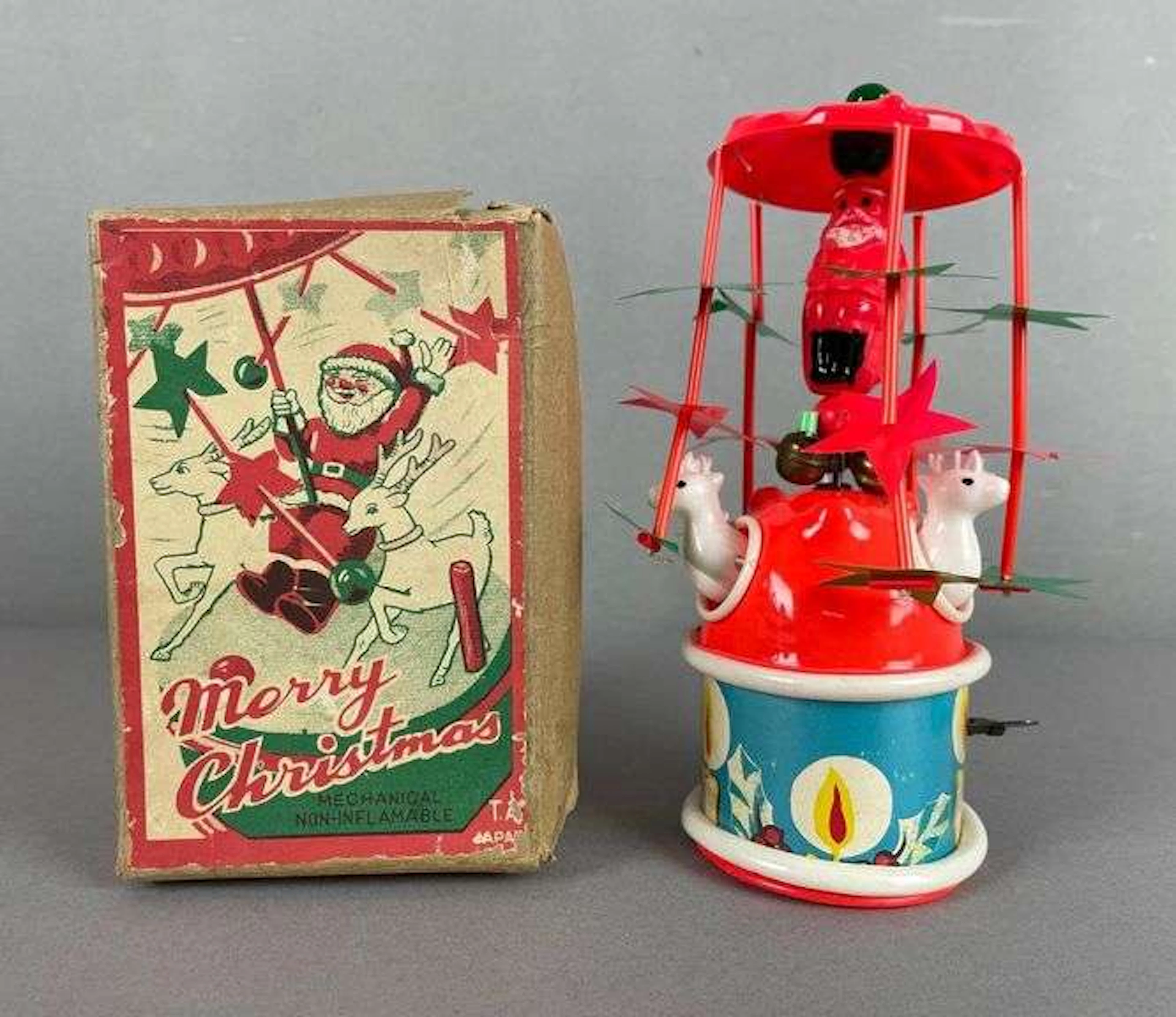 Vintage Japanese Wind-Up Spinning Plastic Santa Claus Toy
