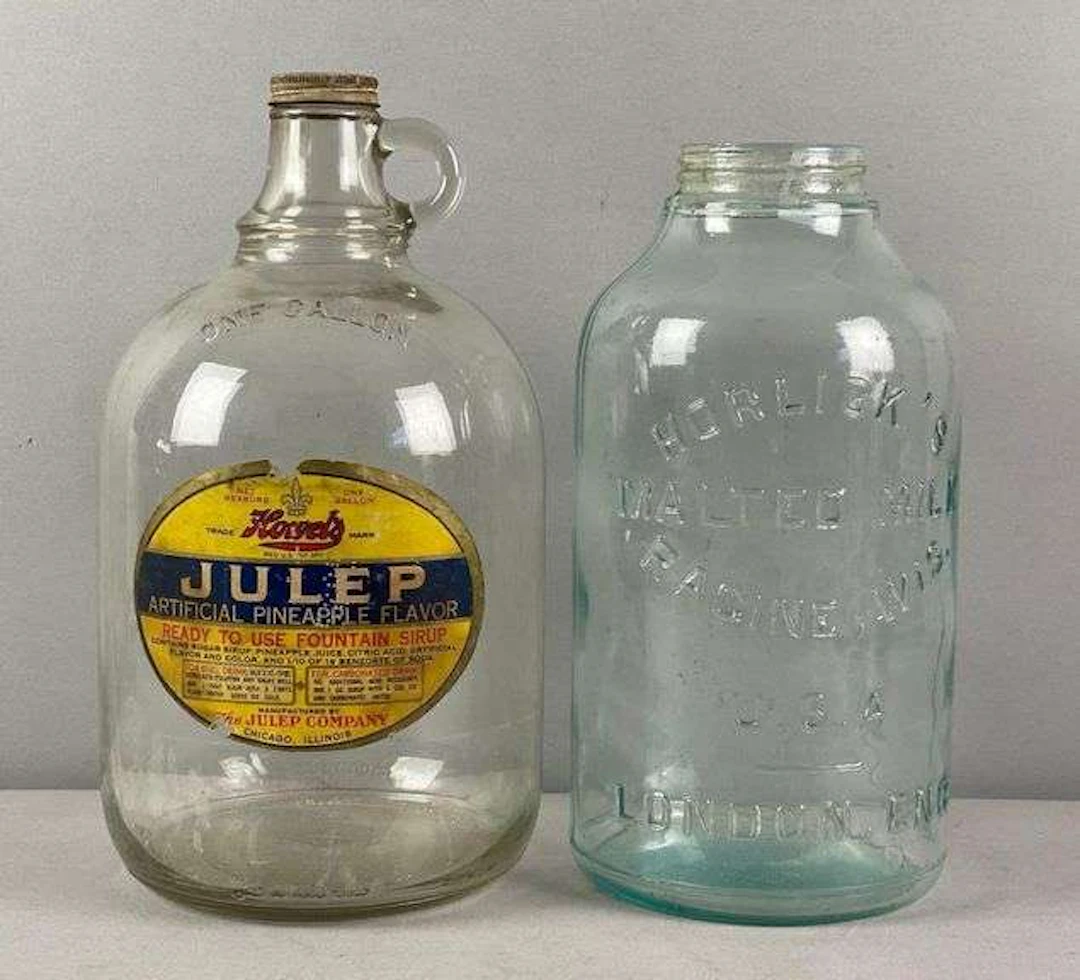 Group of 2 Vintage Glass Advertising Jugs