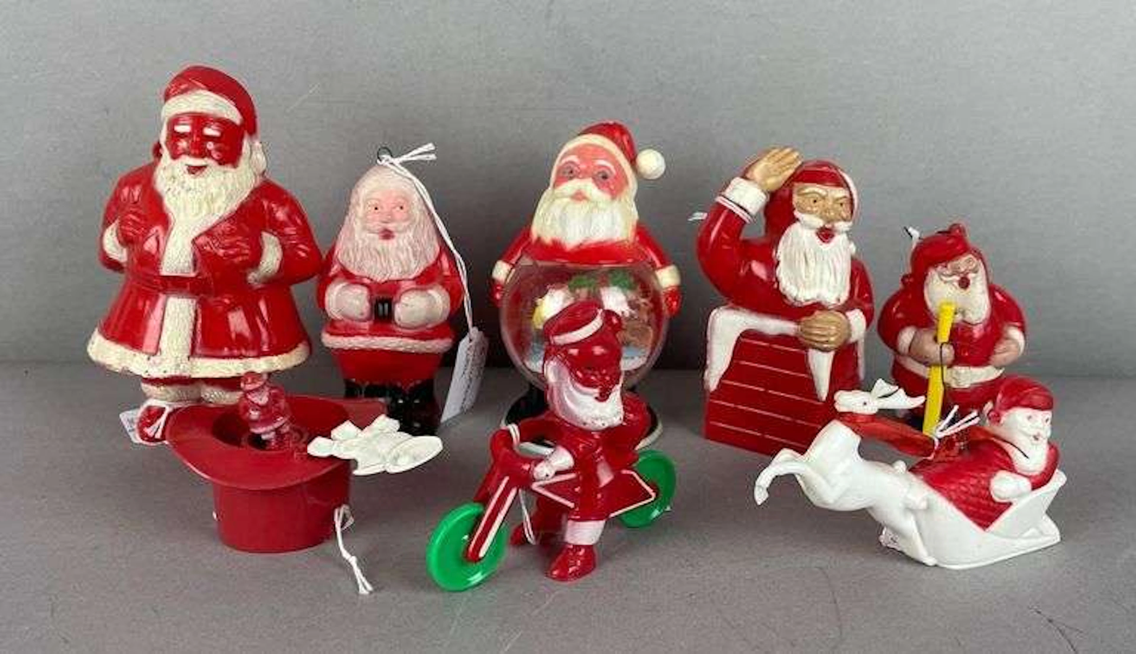Group of Vintage Plastic Santa Claus Figurines