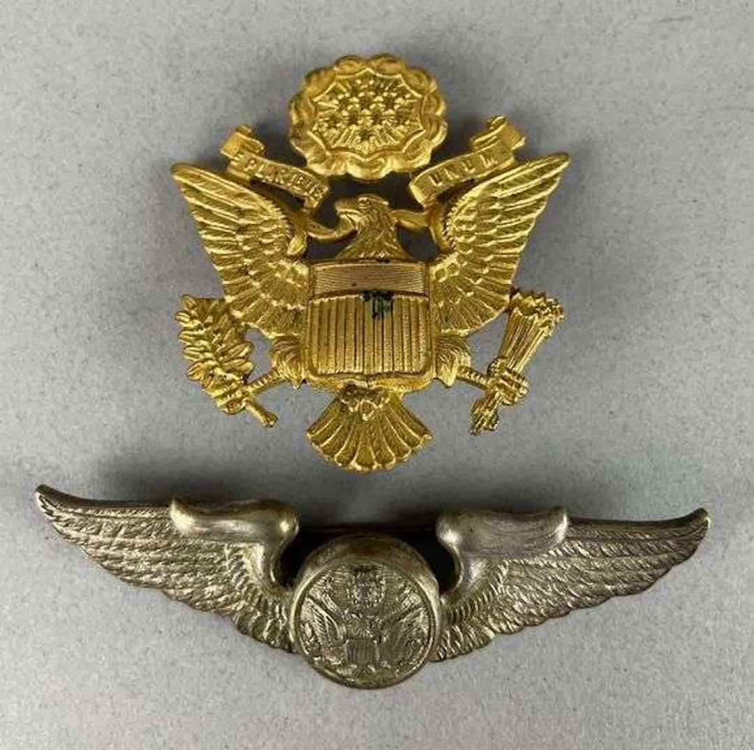 Group of 2 WW2 British Made U.S. Army Badges