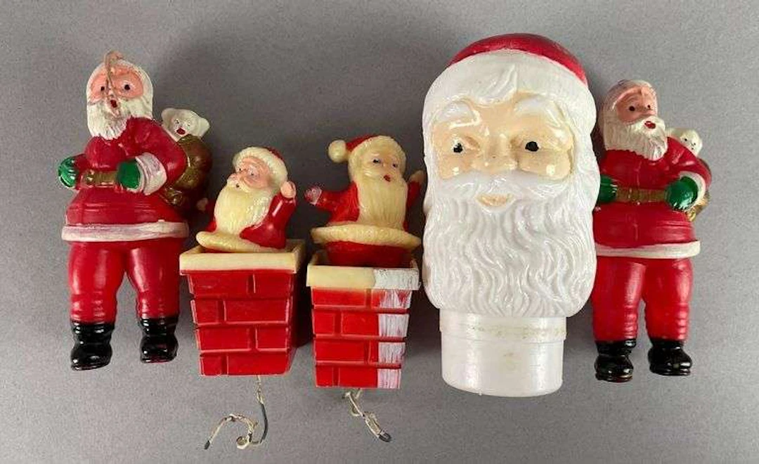 Group of Vintage Plastic Santa Claus Christmas Ornaments