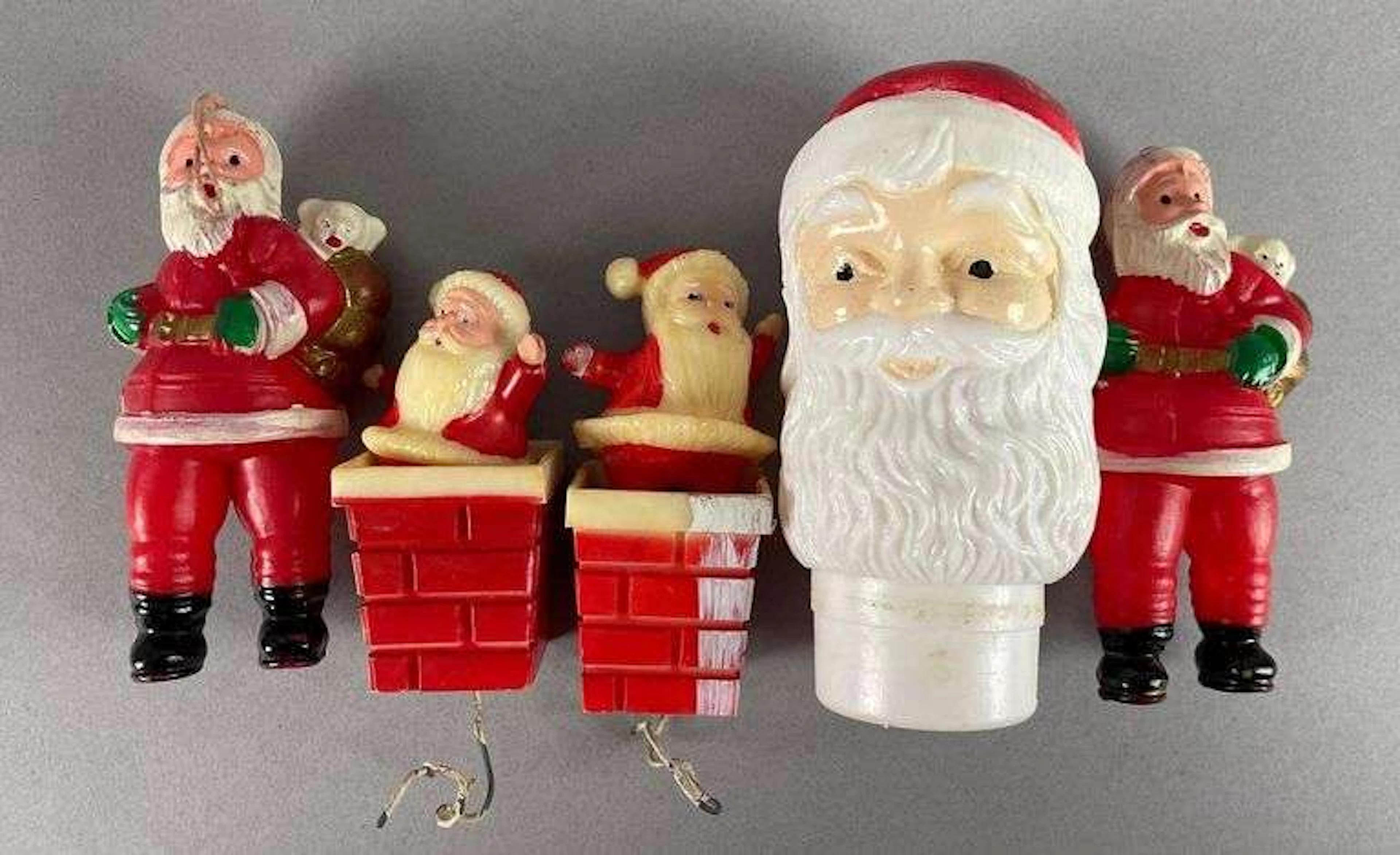 Group of Vintage Plastic Santa Claus Christmas Ornaments