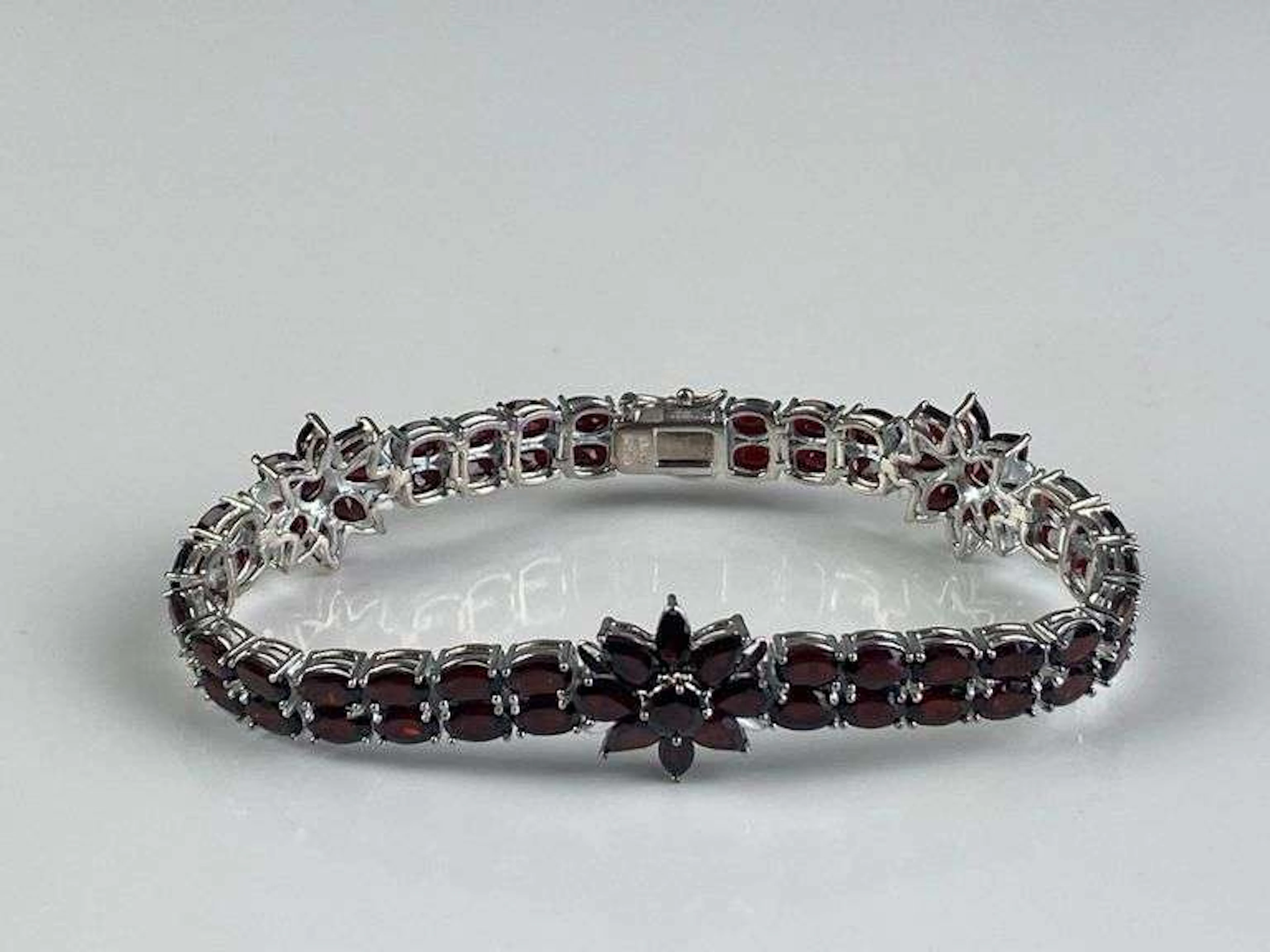 Sterling Silver Garnet Star Cluster Tennis Bracelet