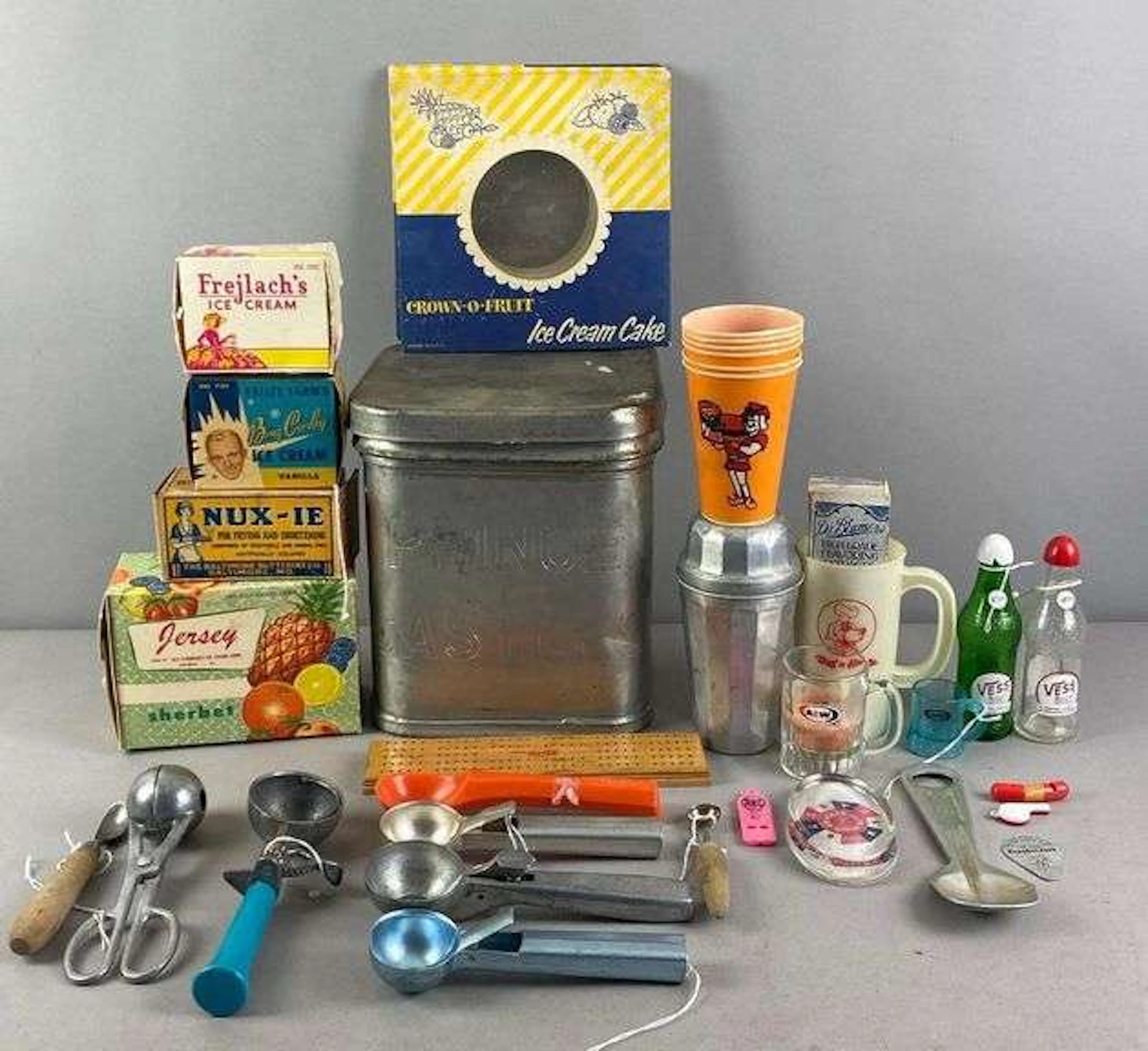 Group of Vintage Ice Cream Scoops and Advertising
