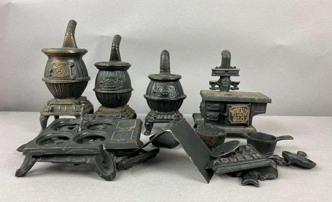 Group of Vintage Cast Iron Pot Belly Stoves and More