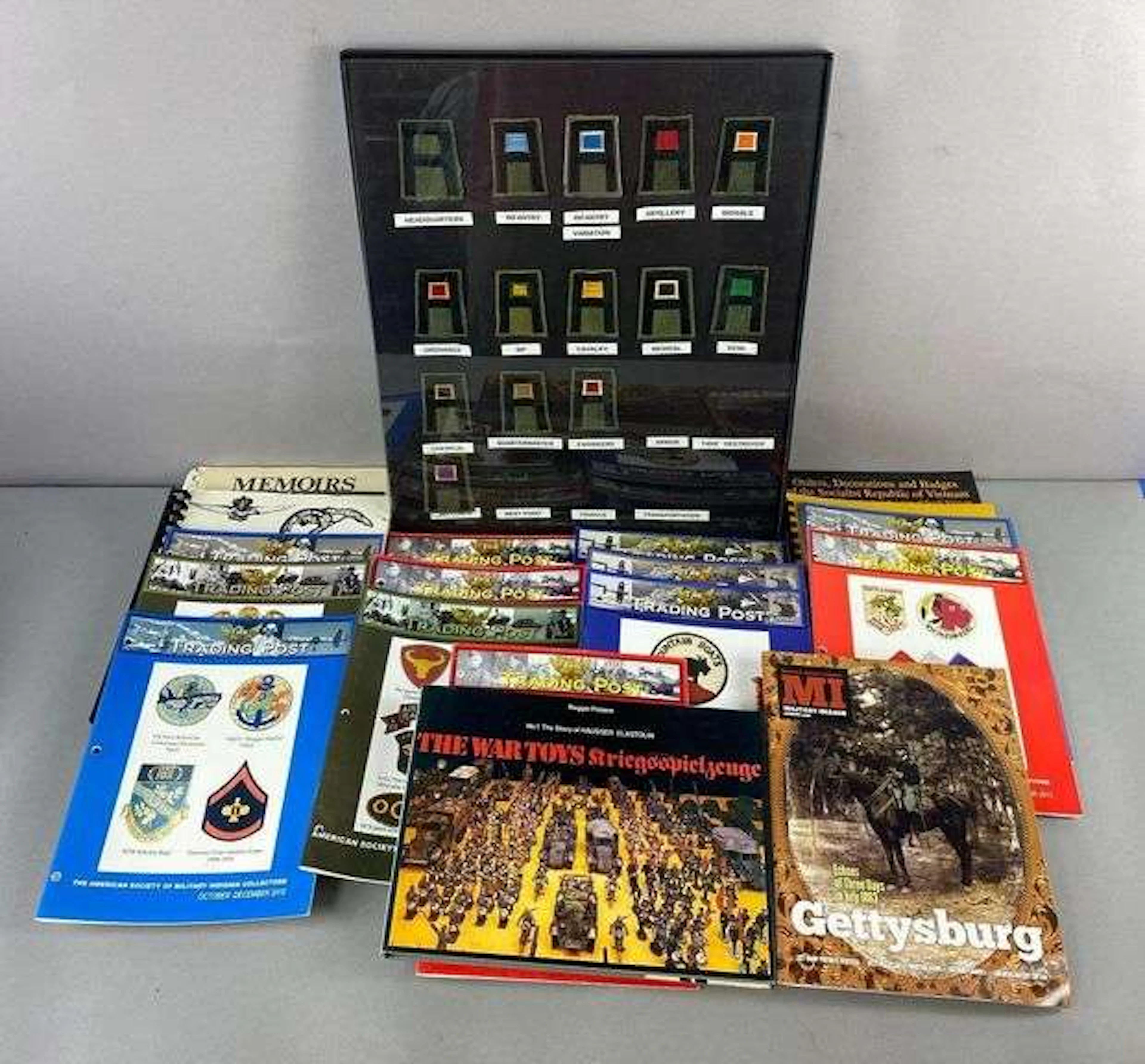 Group of Assorted Trading Post Insignia Refrence Books and More