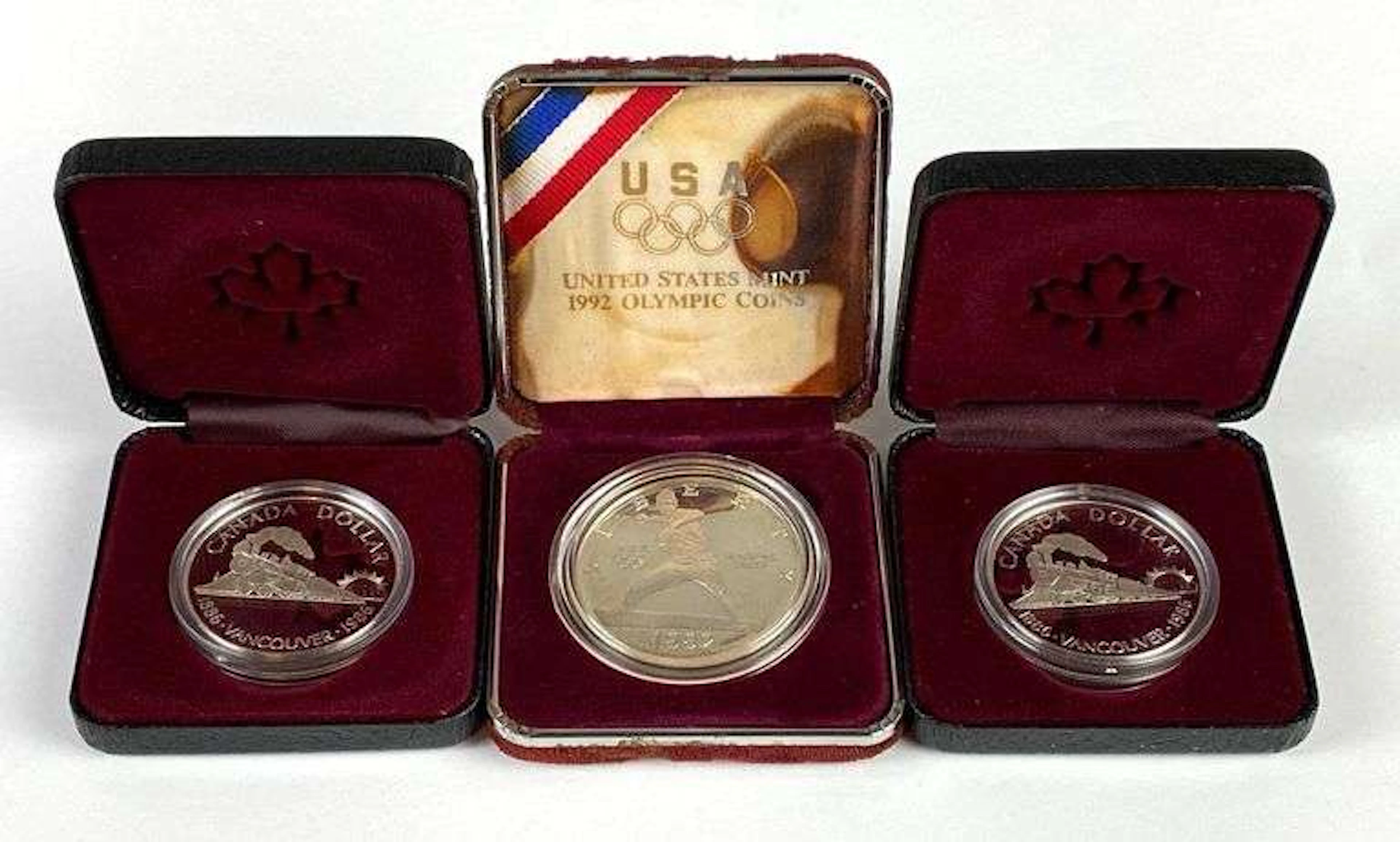 Group of 3 US and Canadian Mint Commemorative Silver Dollars