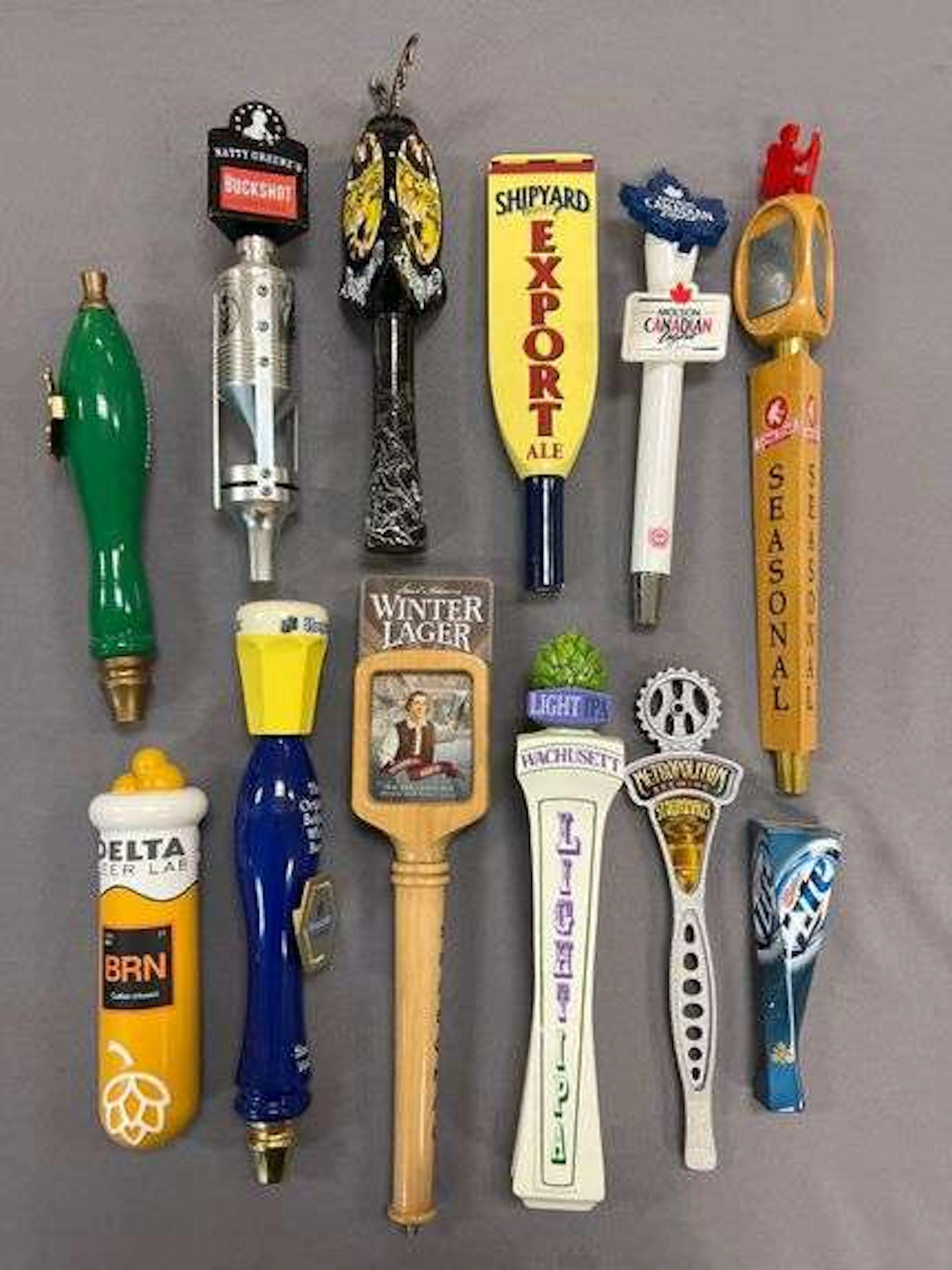 Group of 12 Advertising Beer Tappers