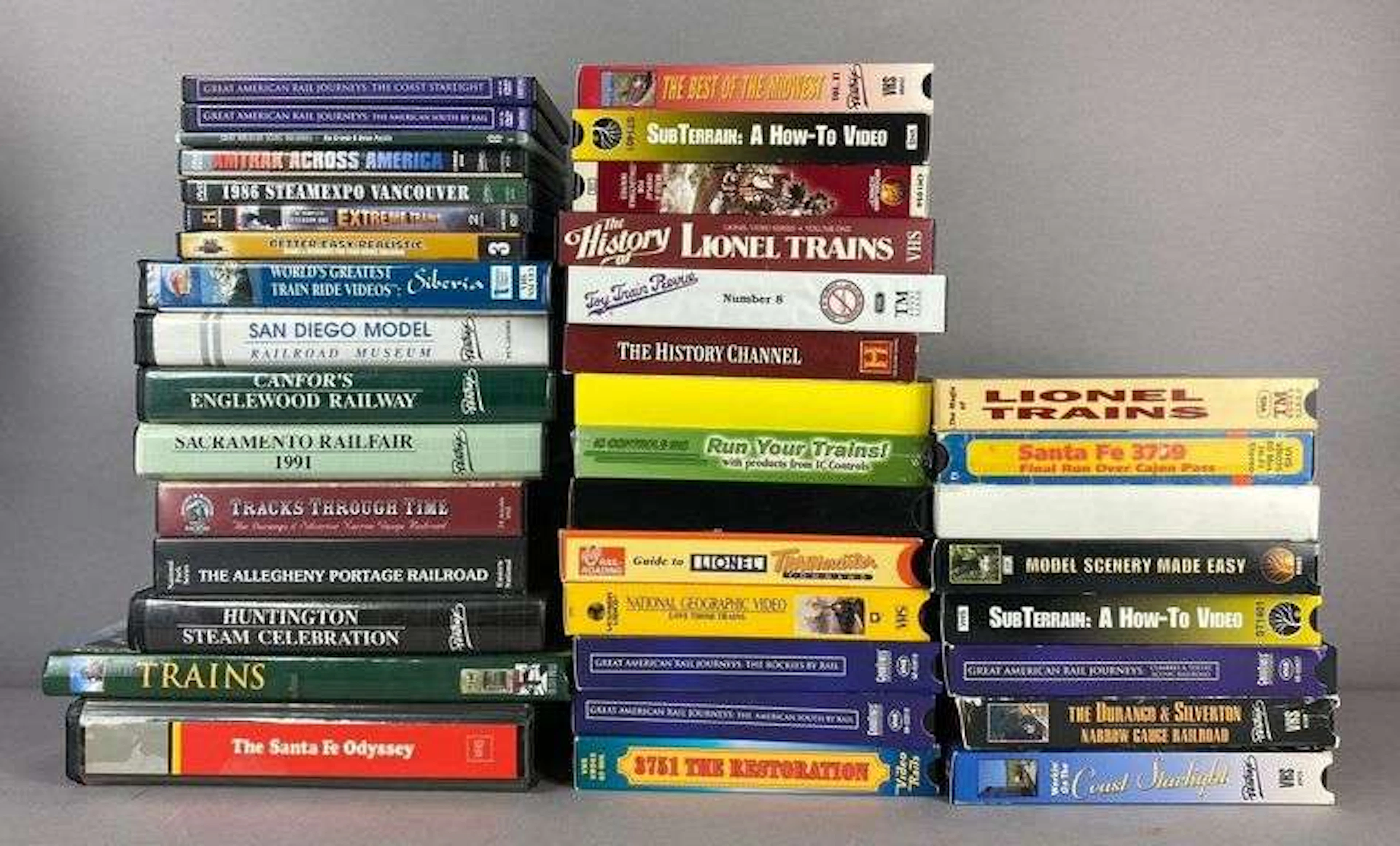Group of Train Themed VHS and DVDs