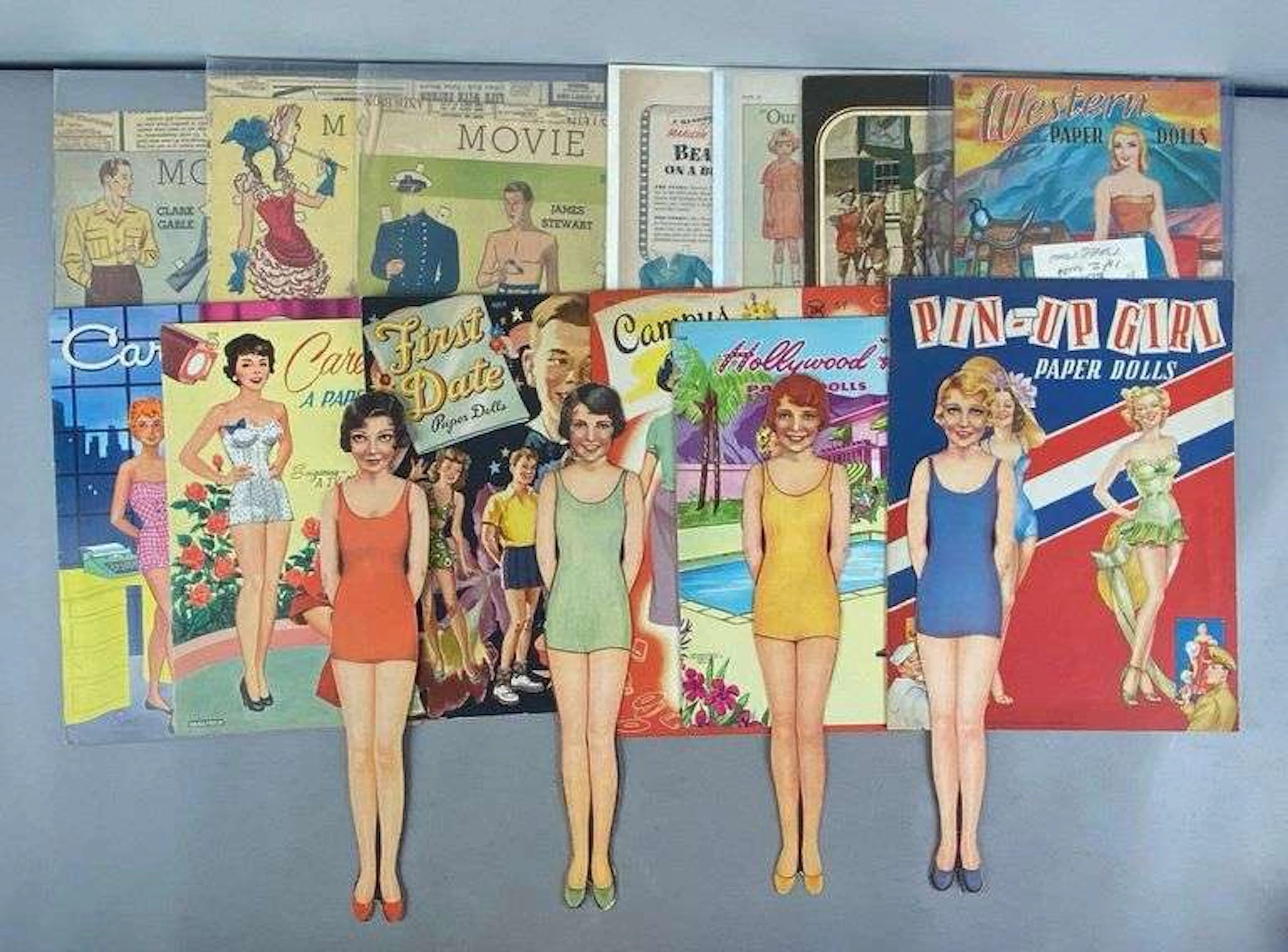Group of Vintage Paper Dolls and Accessoires