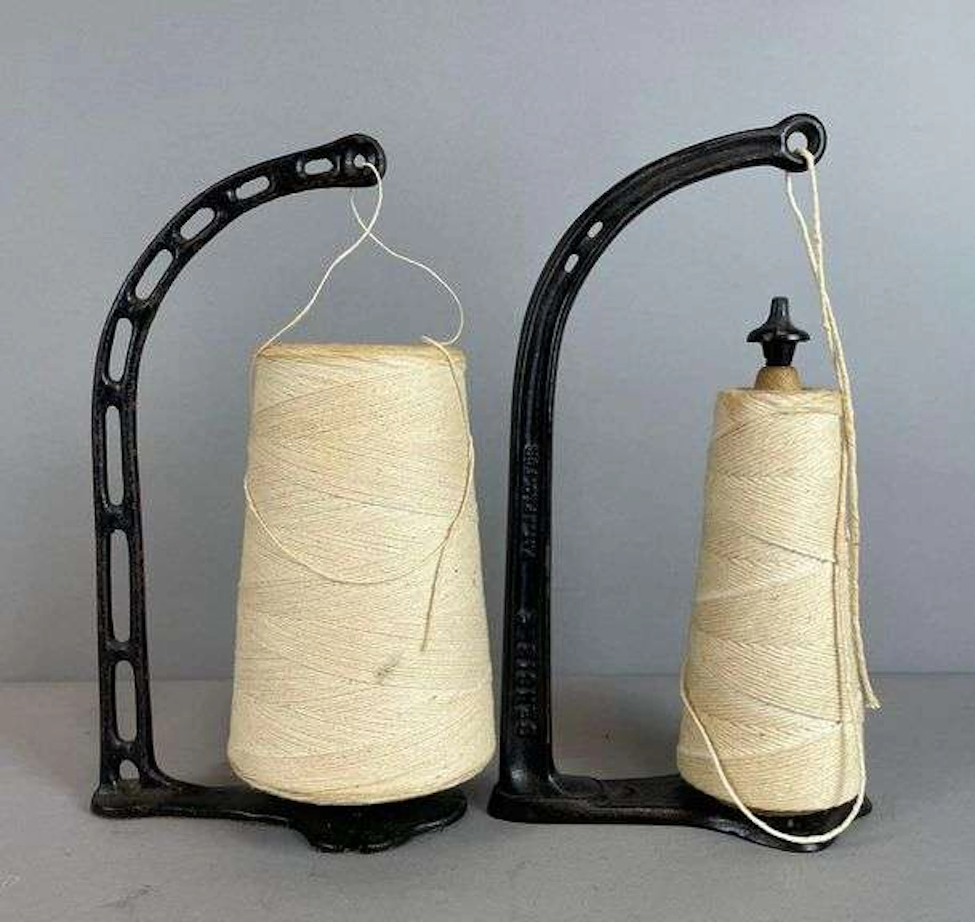 Group of 2 Antique Cast Iron Spool Holders