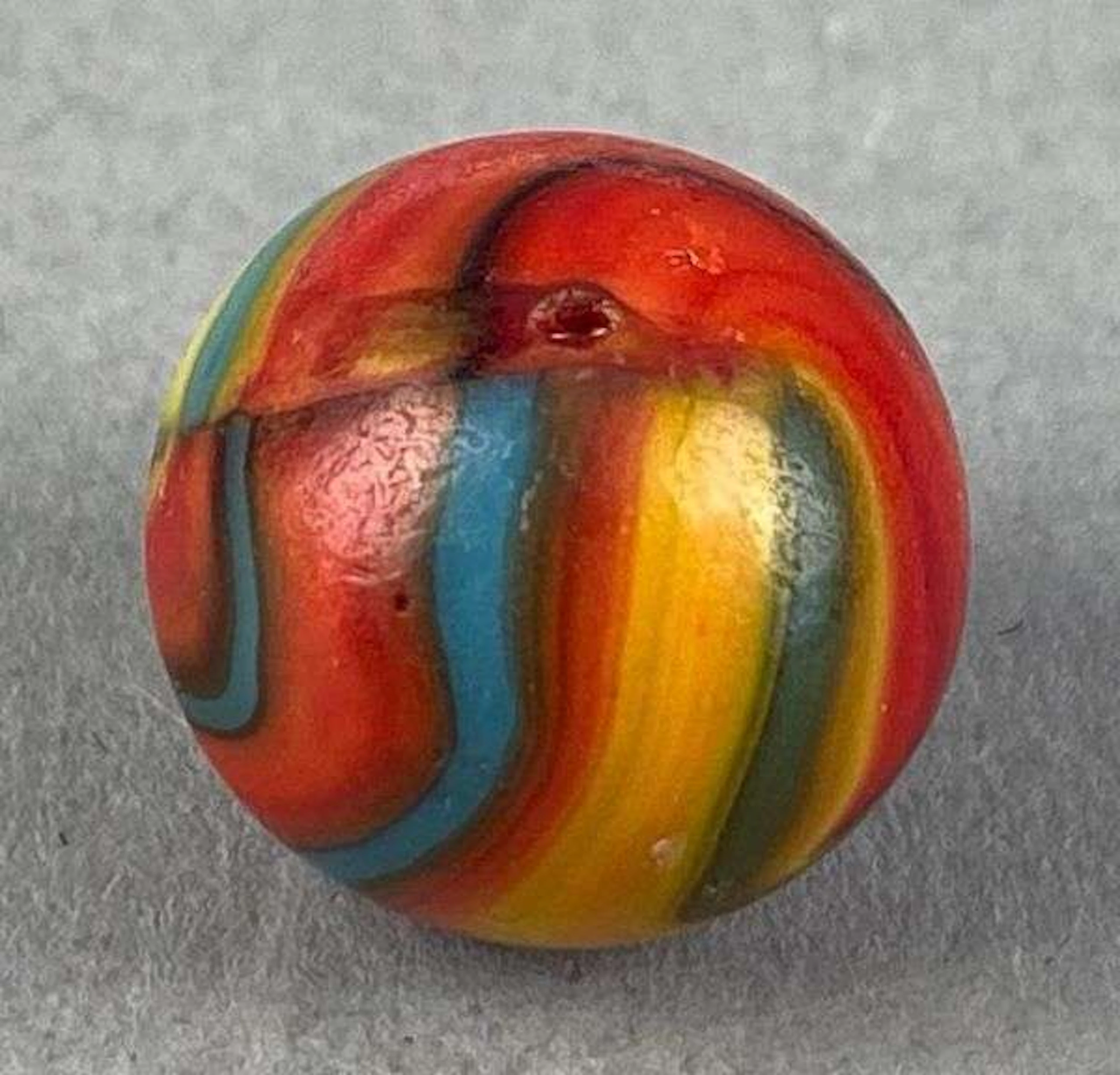 Peltier Glass Co. Golden Superman Glass Marble