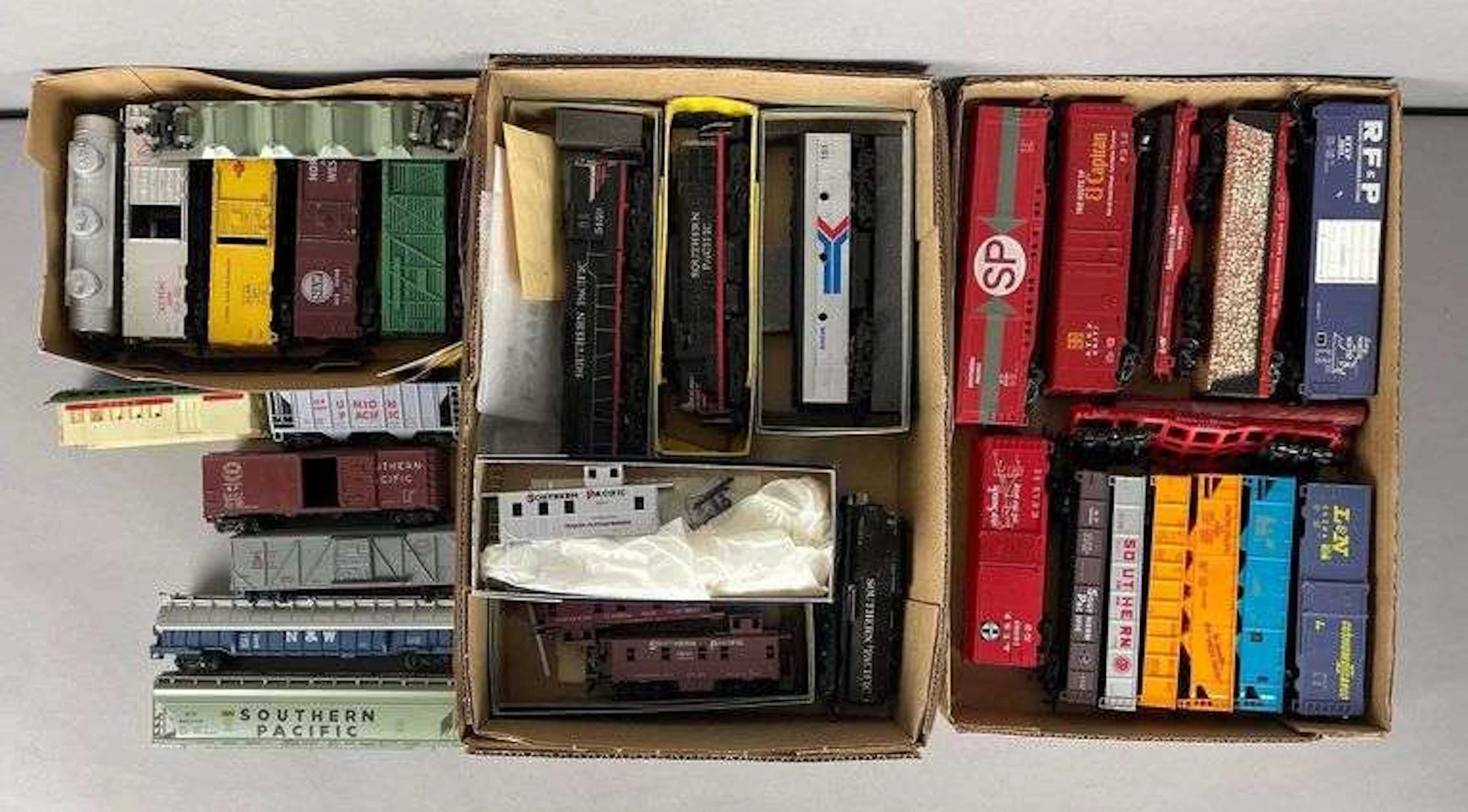 Group of HO Scale Locomotives and Train Cars