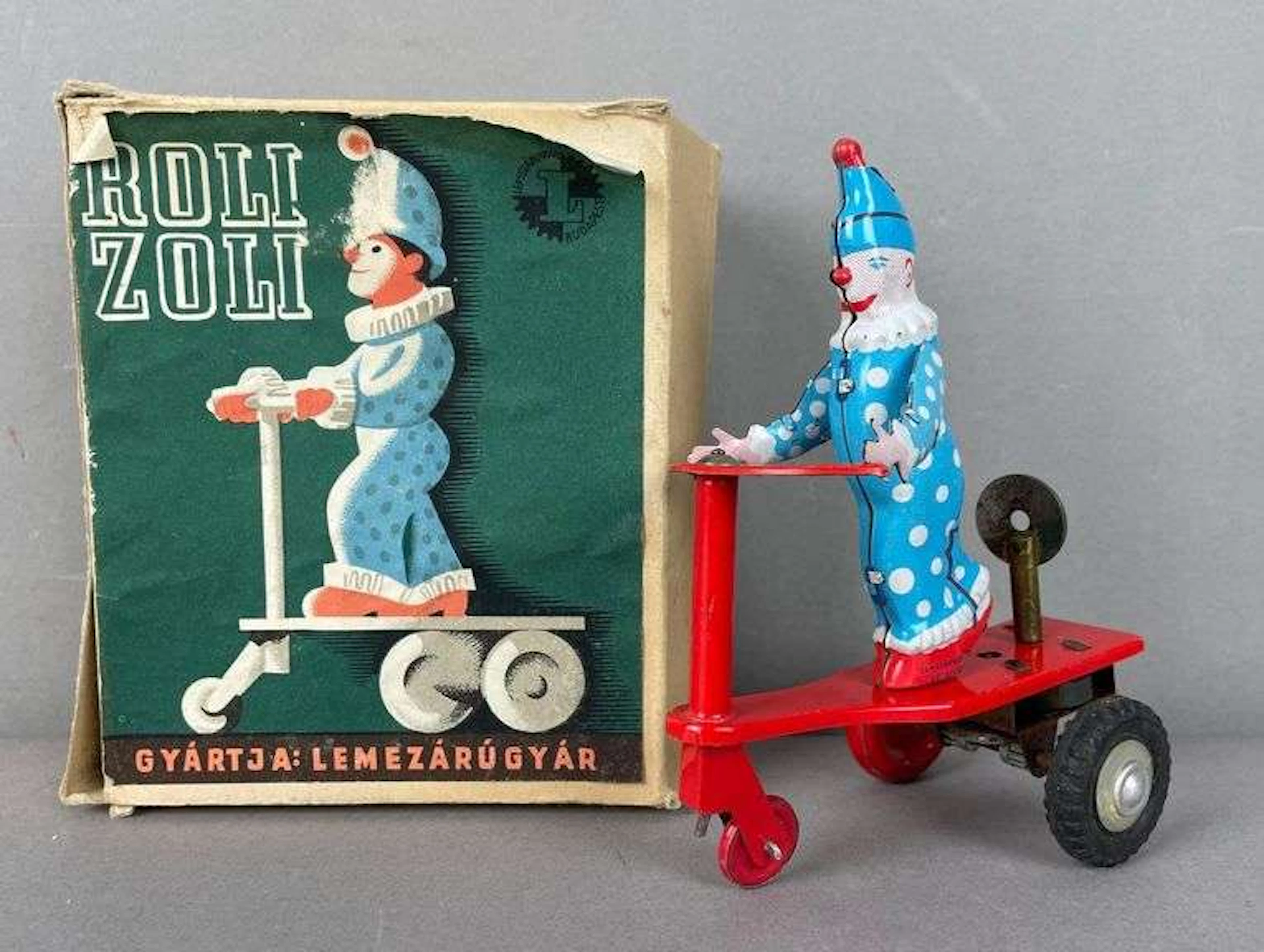 Vintage Roli Zoli Tin Litho Wind-Up Scooter Clown