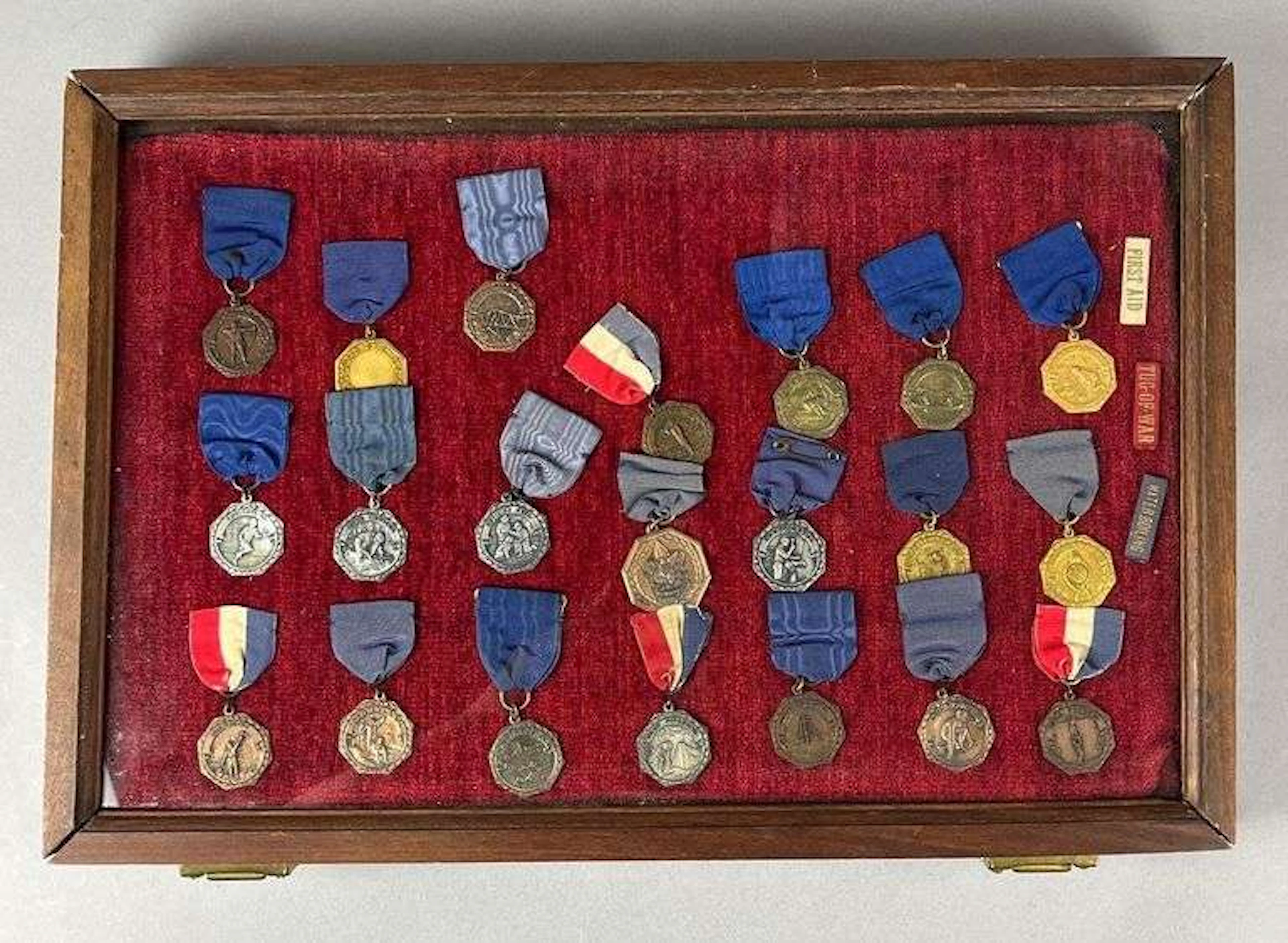 Group of 24 Antique/ Vintage Boy Scouts of America Ribbons in a Display Case