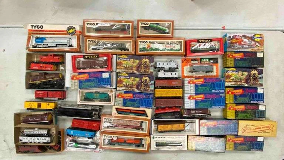 Group of HO Scale Model Train Cars and More