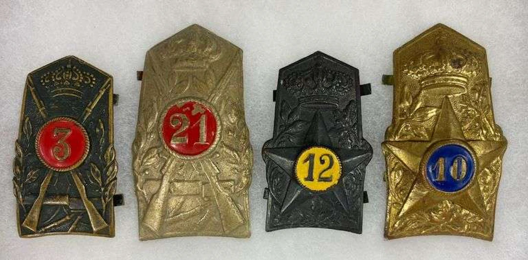 Group of 4 WW2 Italian Adrian helmet Plates