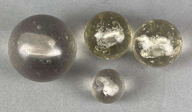 Group of 4 Antique Sulphide Glass Marbles