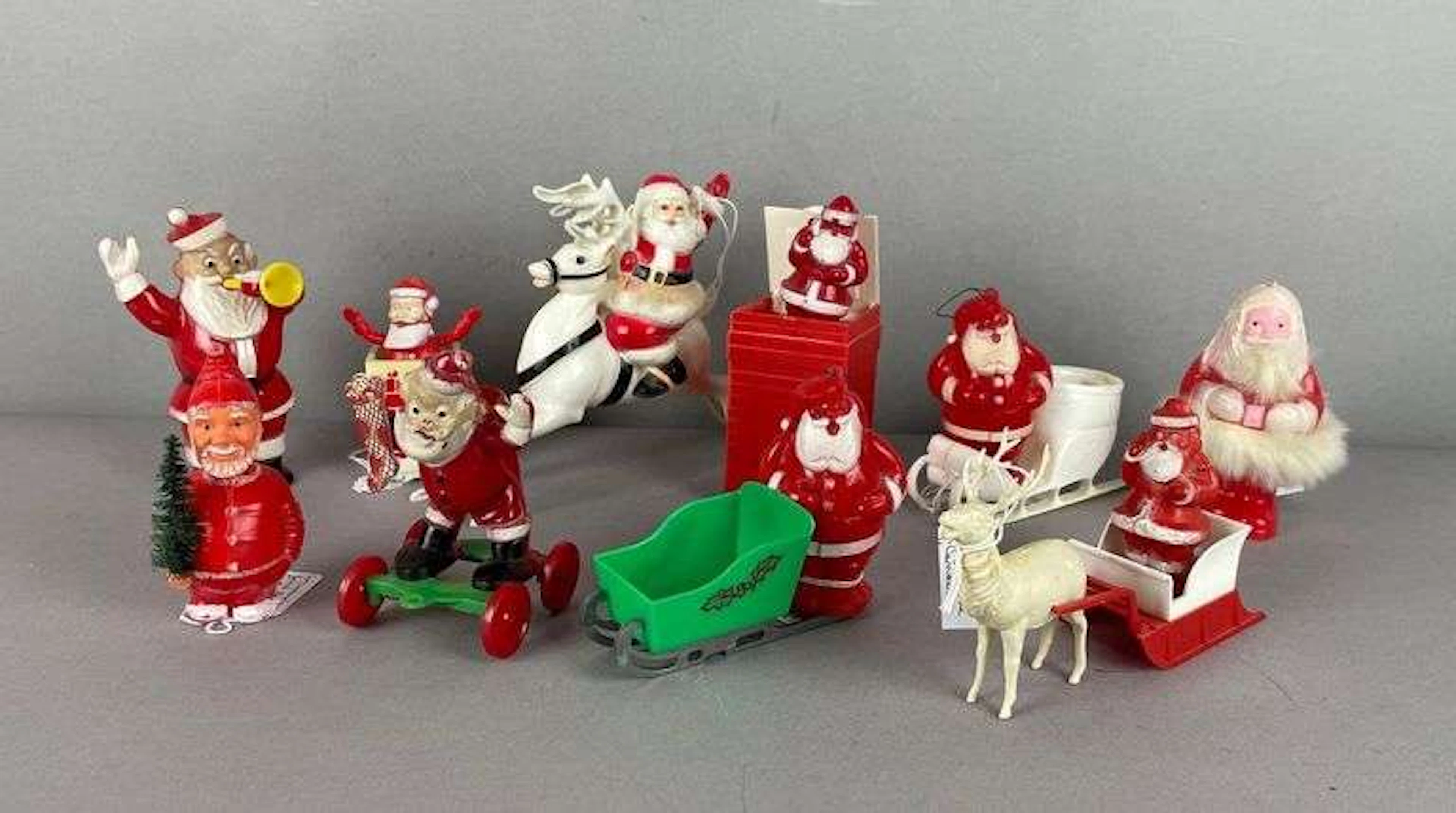Group of Vintage Santa Claus Plastic Candy Containers and More