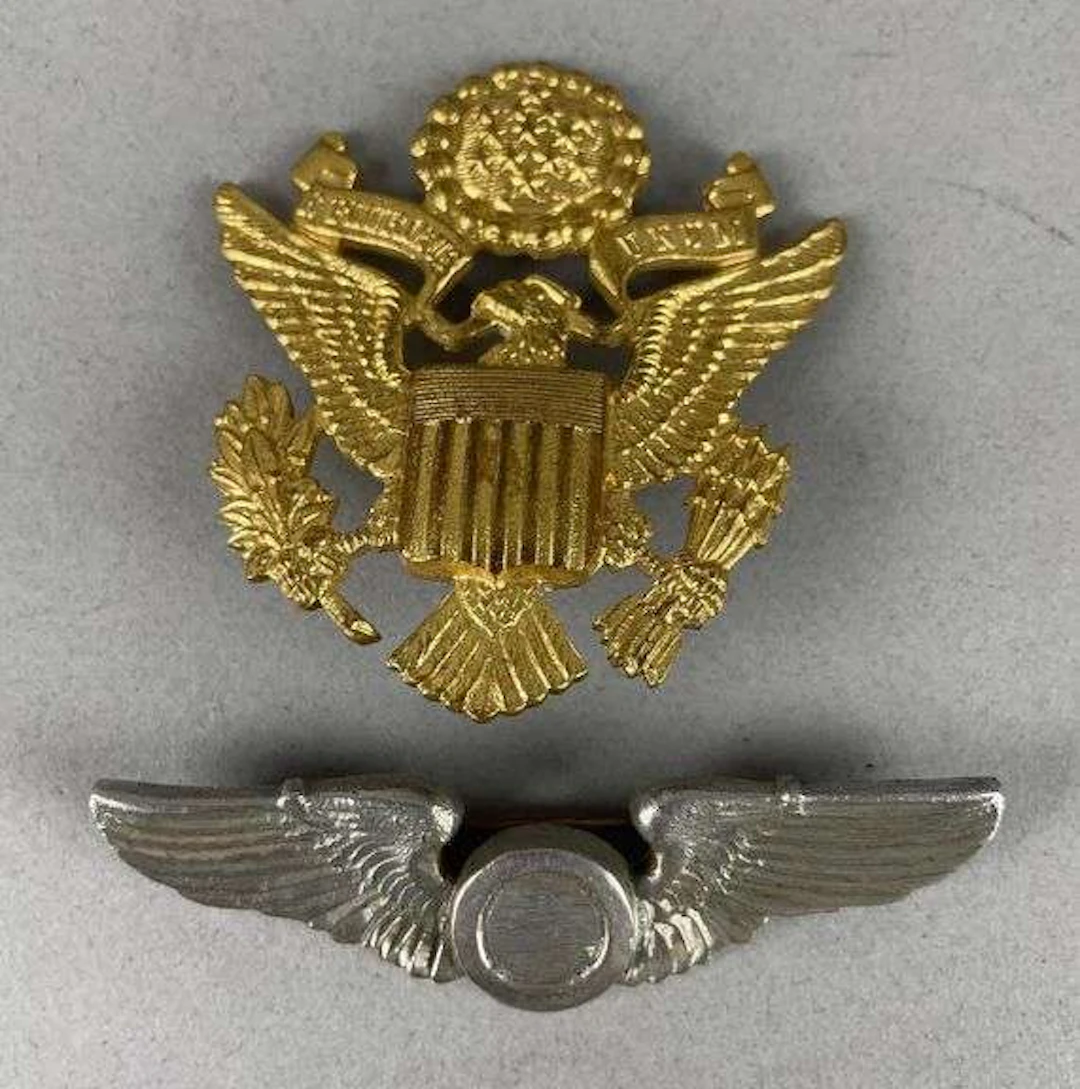 Group of 2 WW2 British Made U.S. Army Badges
