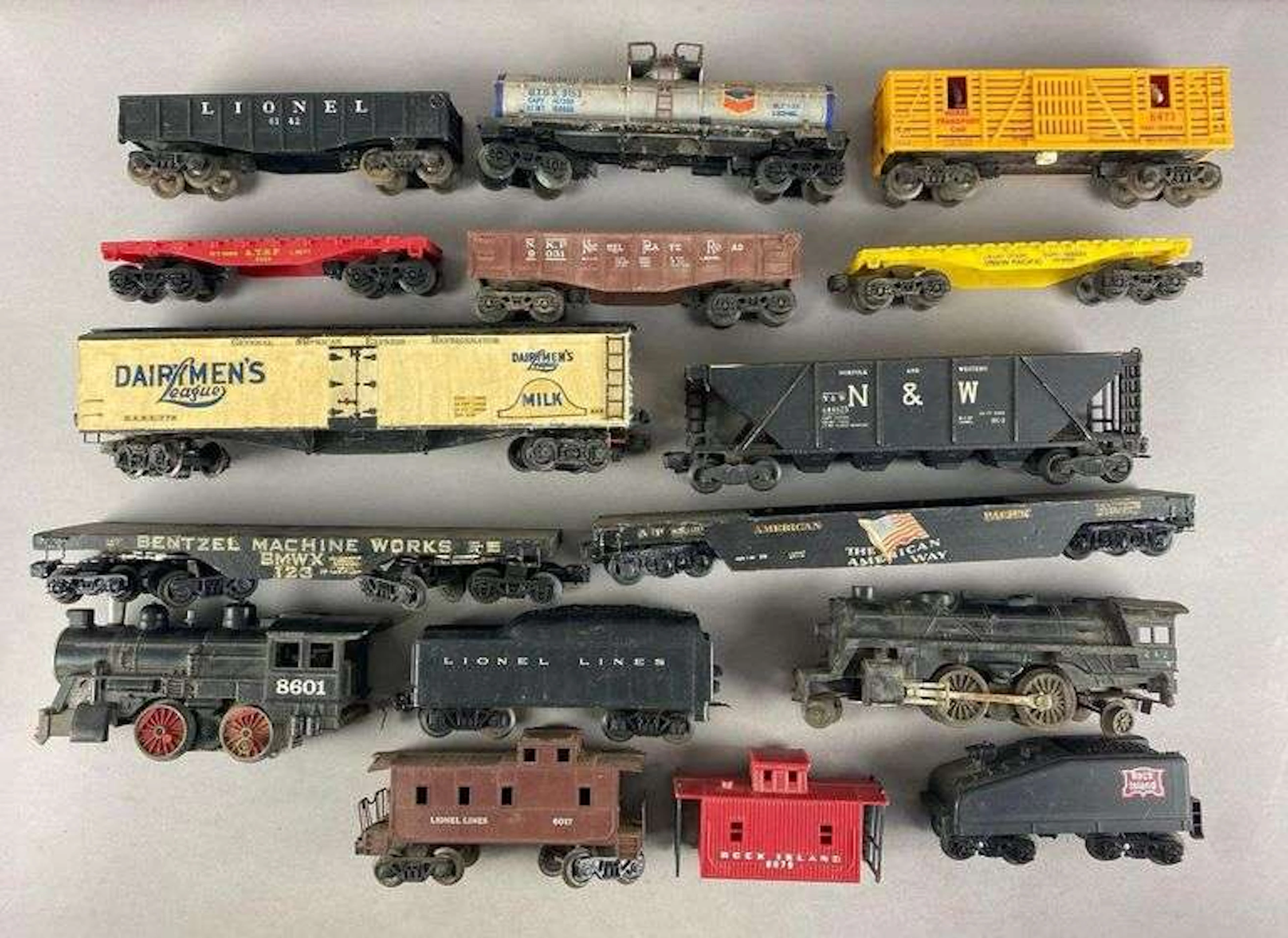 Group of O Scale Locomotives and Train Cars