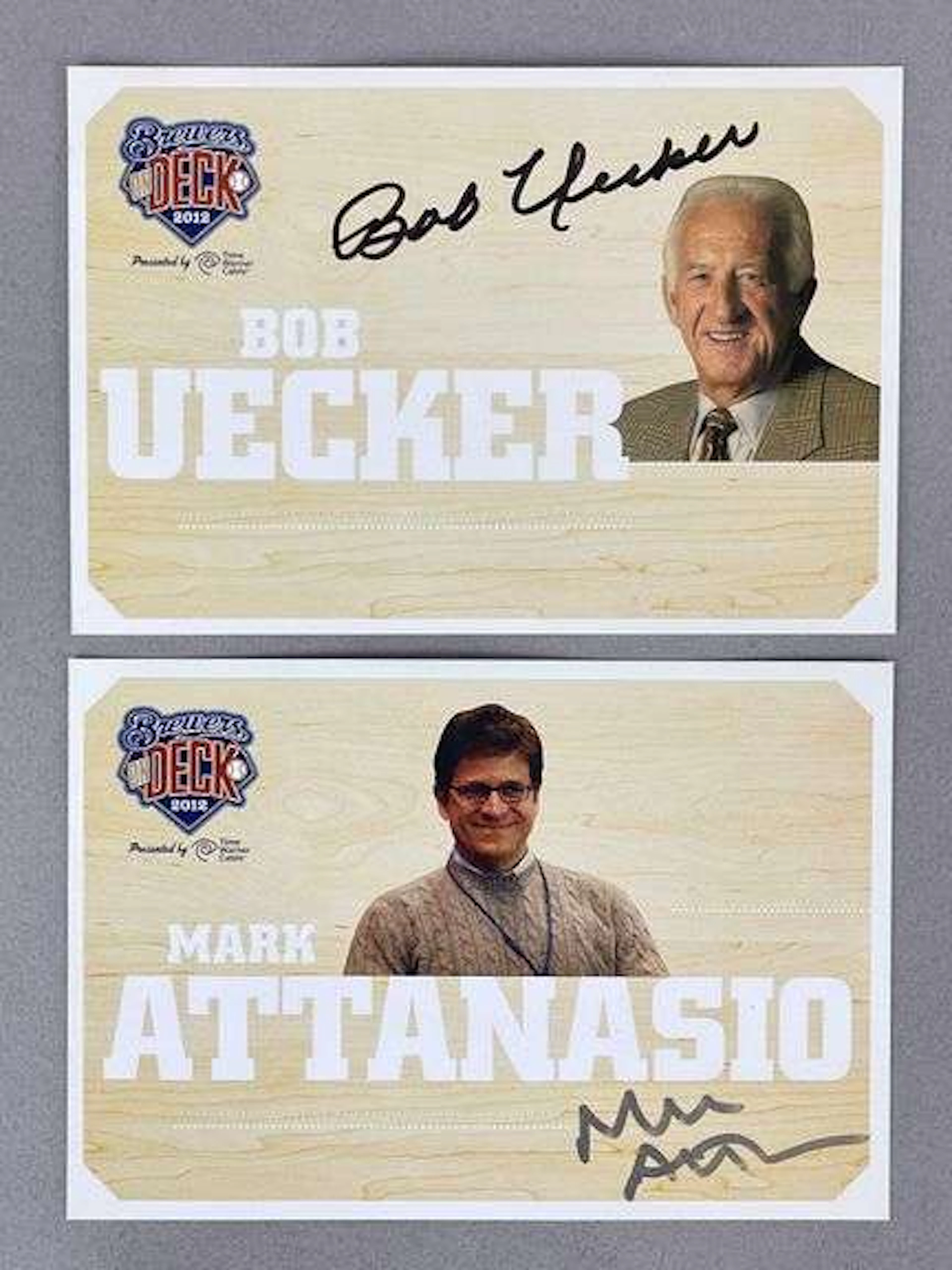 Bob Uecker and Mark Attanasio, Brewers Owner, Signed 2012 Brewers on Deck Cards