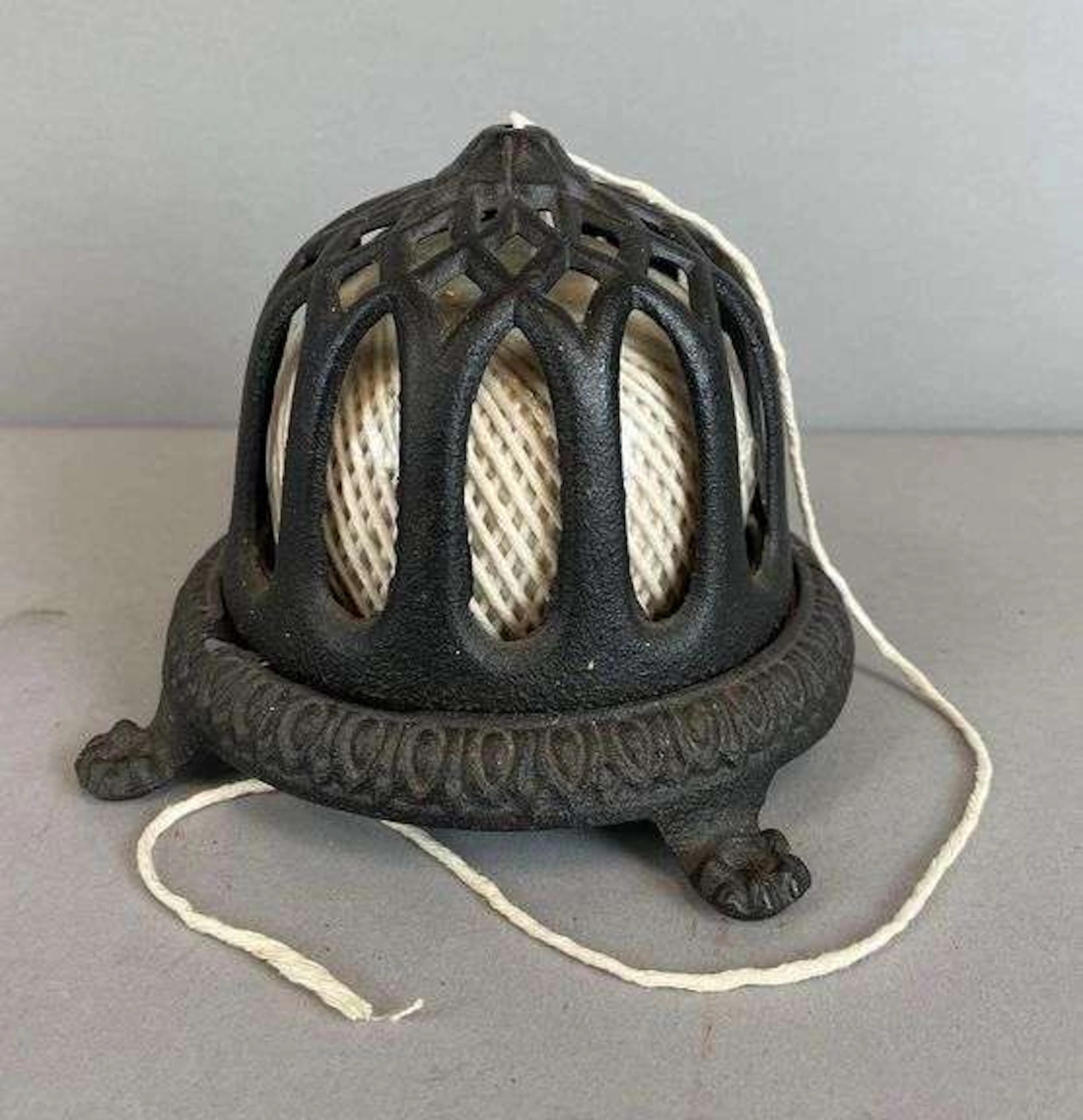 Antique Cast Iron String Holder