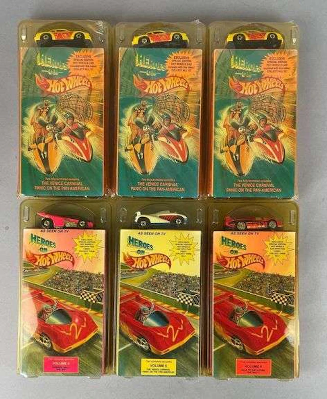 Group of Heroes on Hot Wheels VHS Tapes with Die-Cast Cars