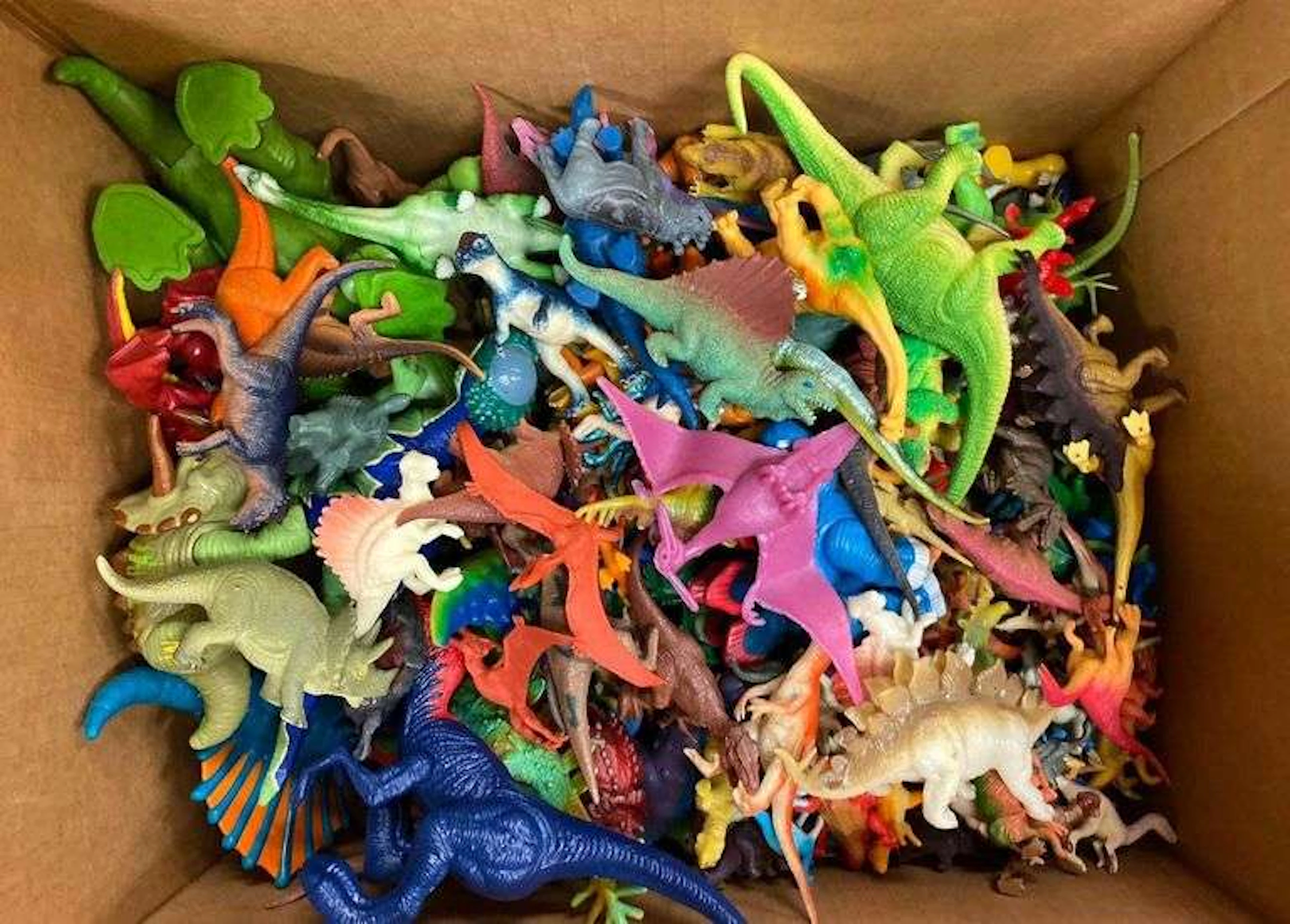 Group of 100+ Plastic Dinosaurs Figure Toys