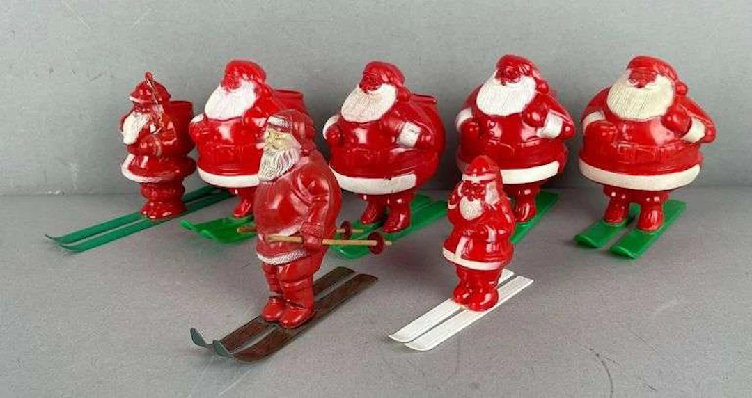 Group of Vintage Plastic Skiing Santa Christmas Decorations