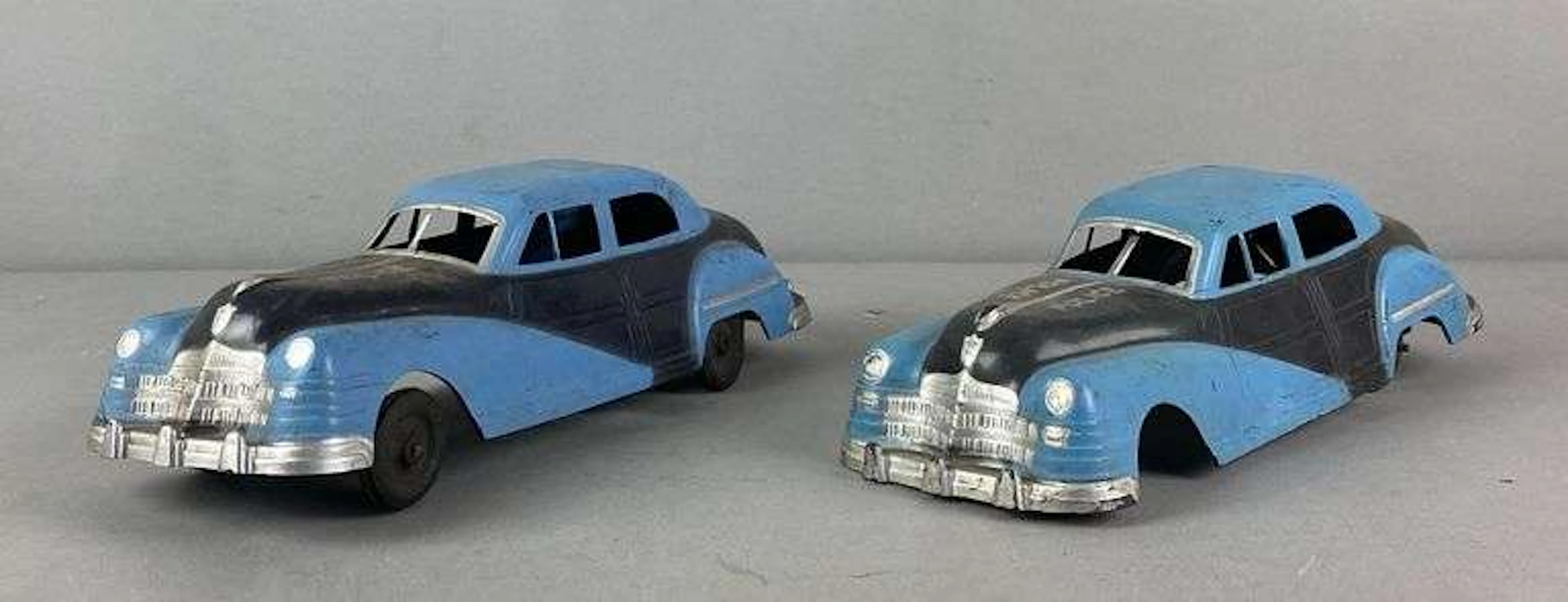 Group of 2 Vintage Irwin Town and Country Wind Up Toy Police Sedans