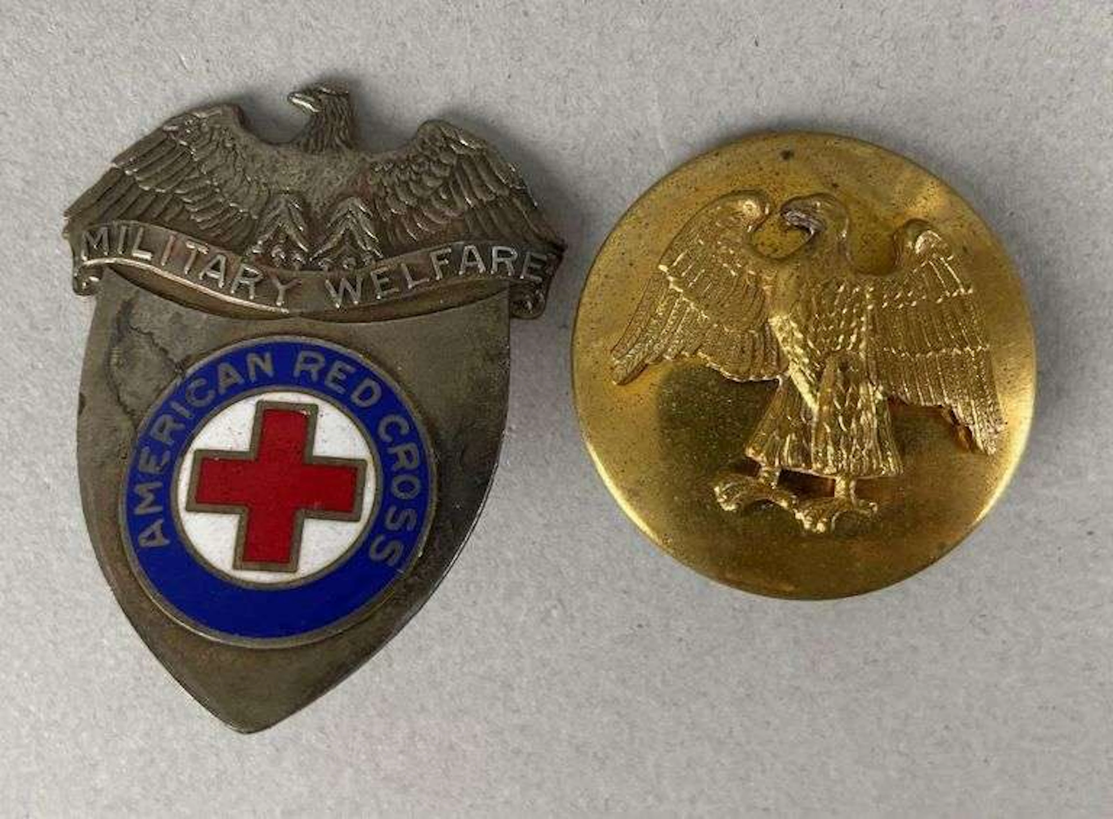 Group of 2 WW2 U.S. Military Cap Badges