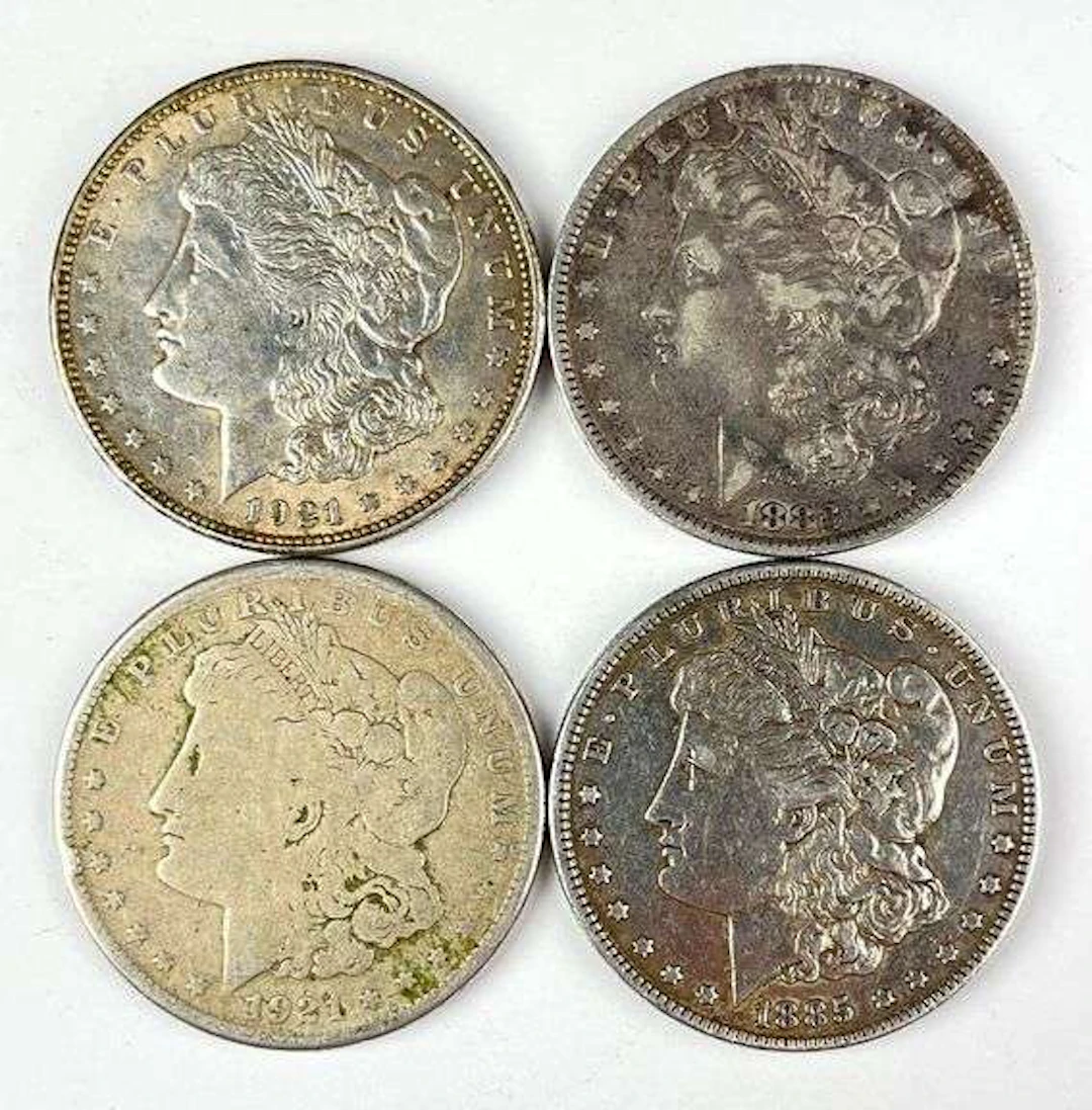 Group of 4 Morgan Silver Dollars
