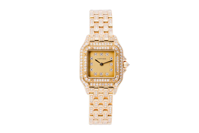 A Small Diamond Set Cartier Panthere in Yellow Gold