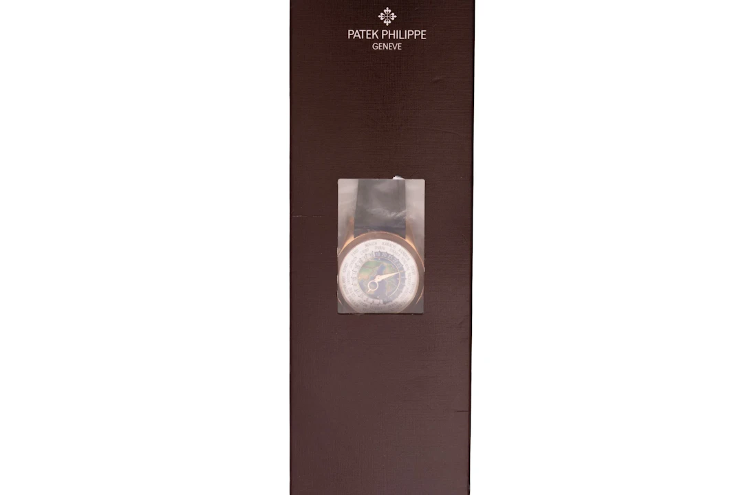 Patek Philippe World Time 5131R-001 'Single Sealed' (POA) - Maunder Watch Co.