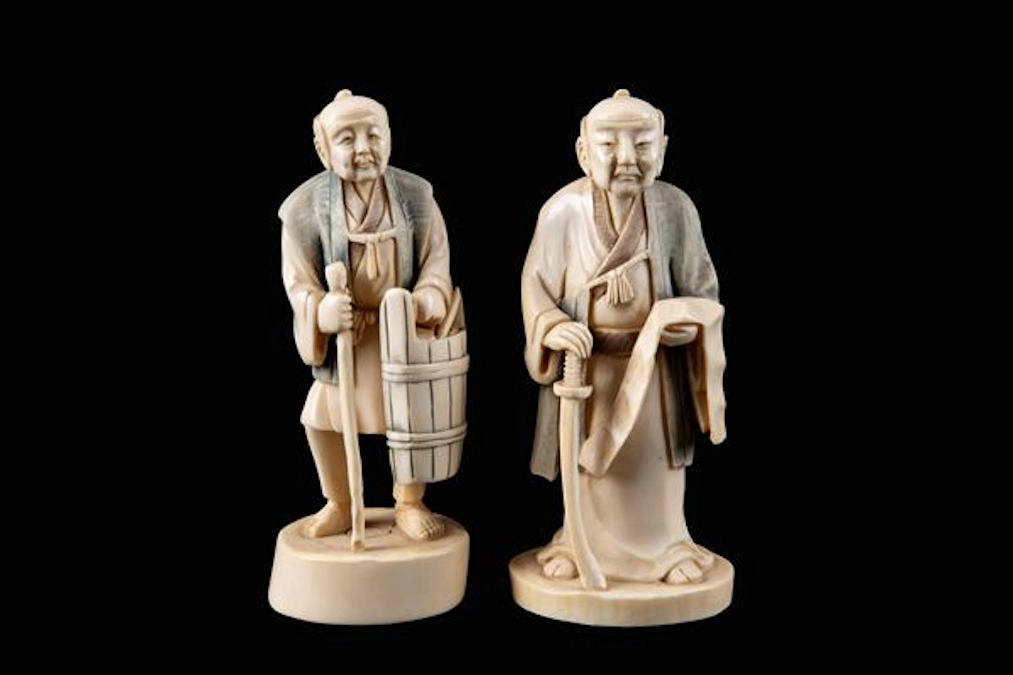 Two ivory sculptures "ELDERLY"