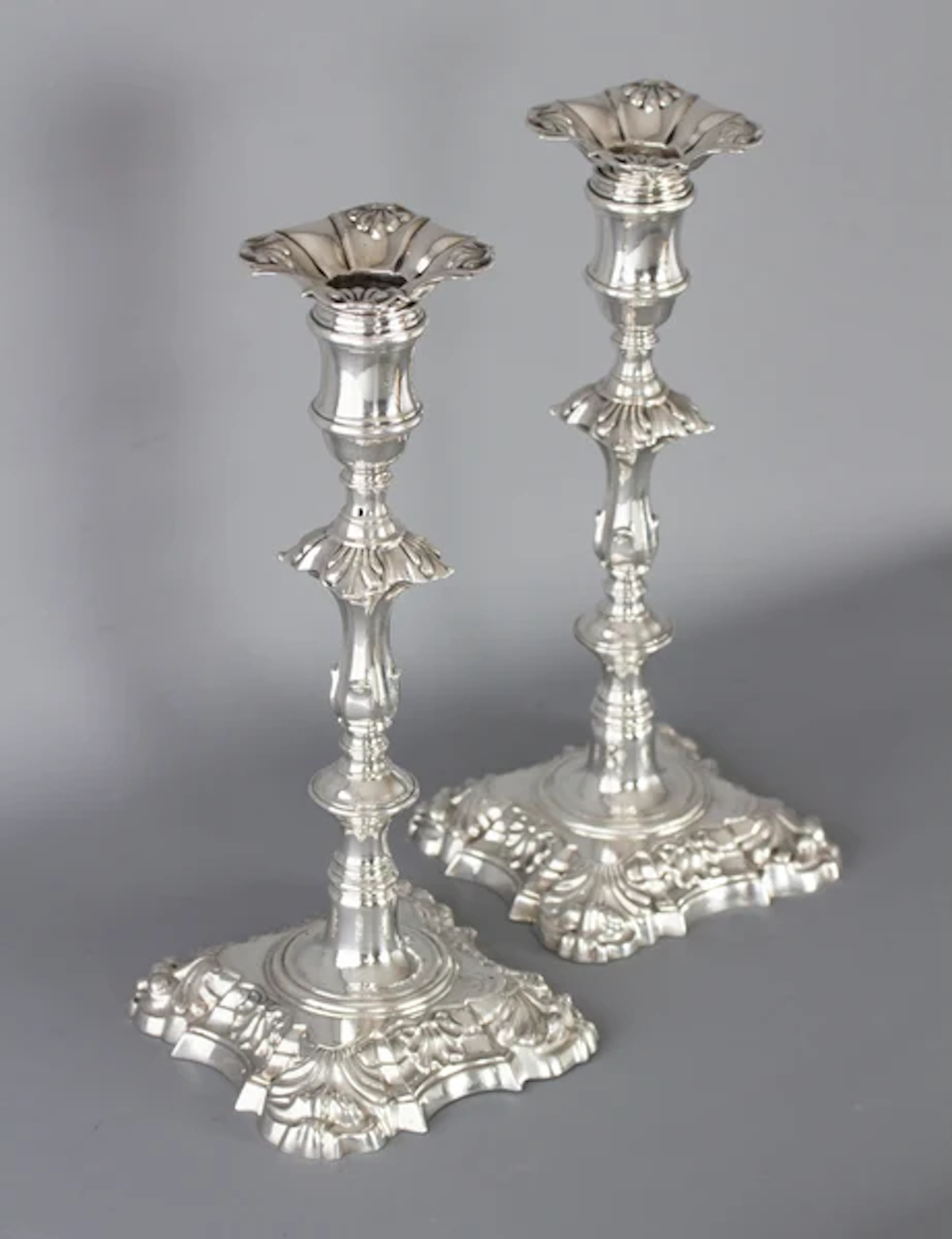 A Very Fine Pair of Georgian Cast Silver Candlesticks by John Cafe London 1757