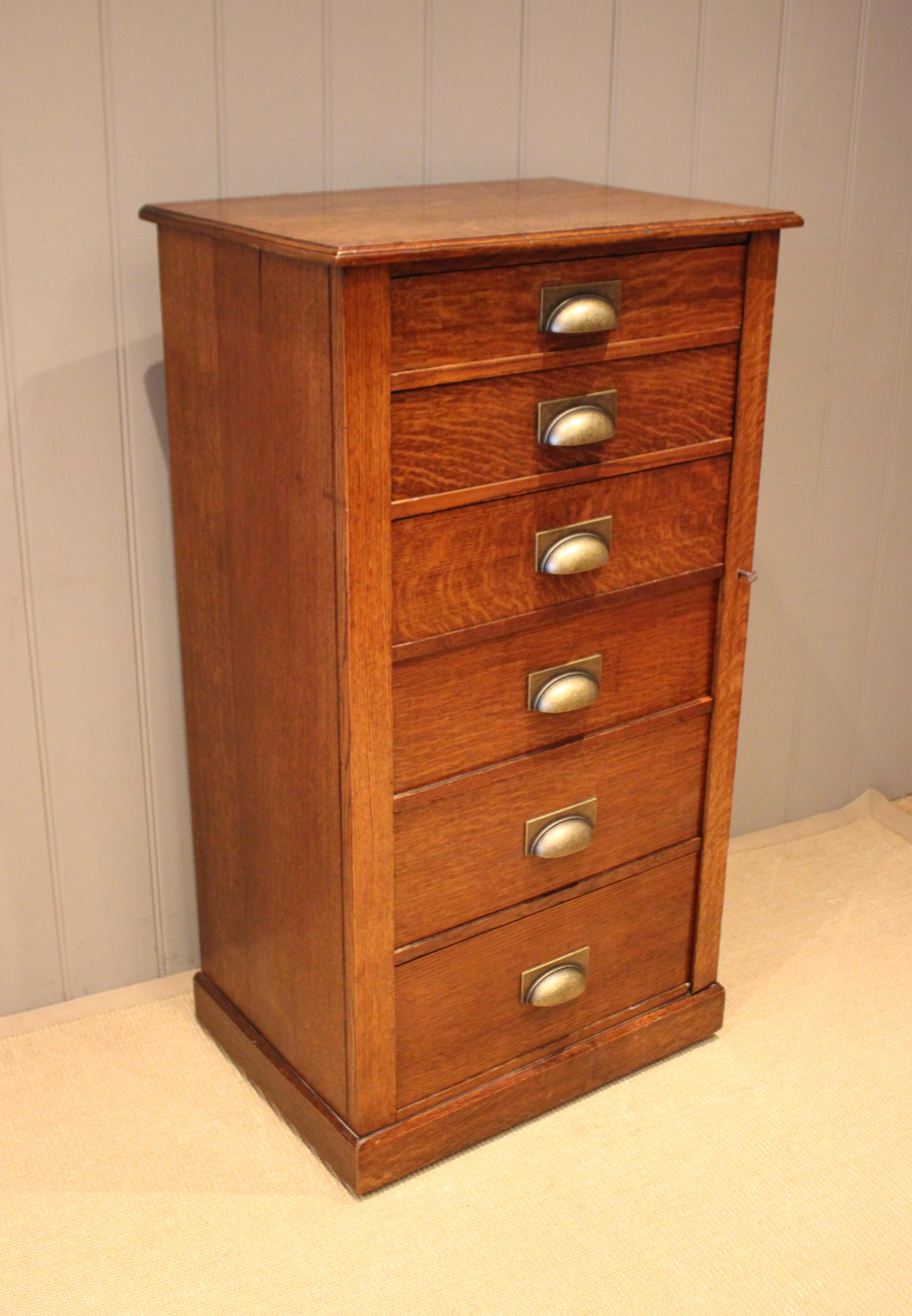 Edwardian Oak Lockable Wellington Style Chest Of Drawers