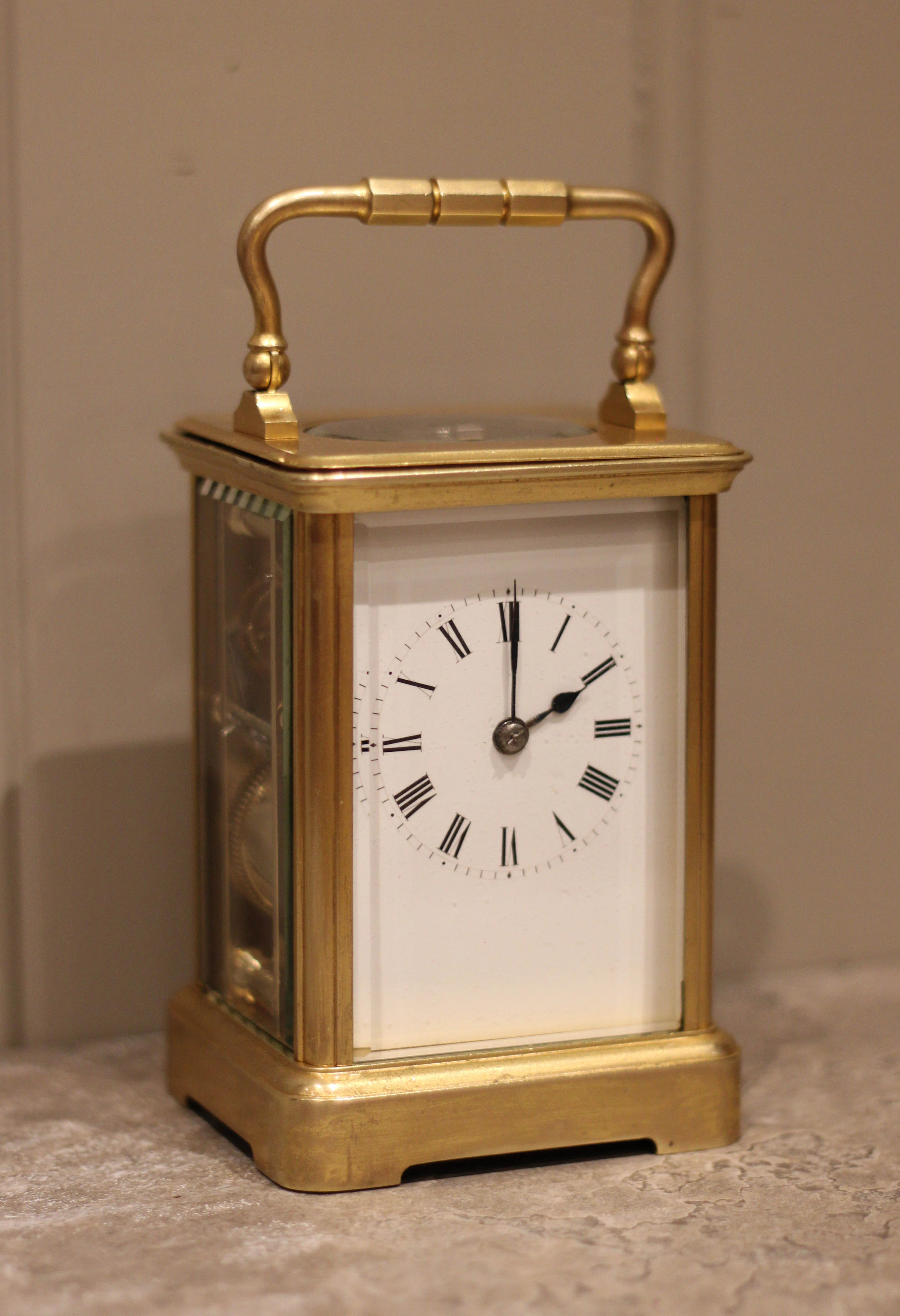 French Striking Gilt Carriage Clock