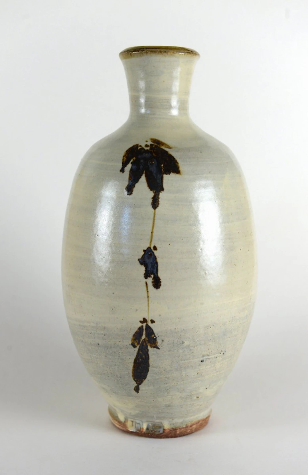 Footed bottle, white slip, iron painting by Jim Malone