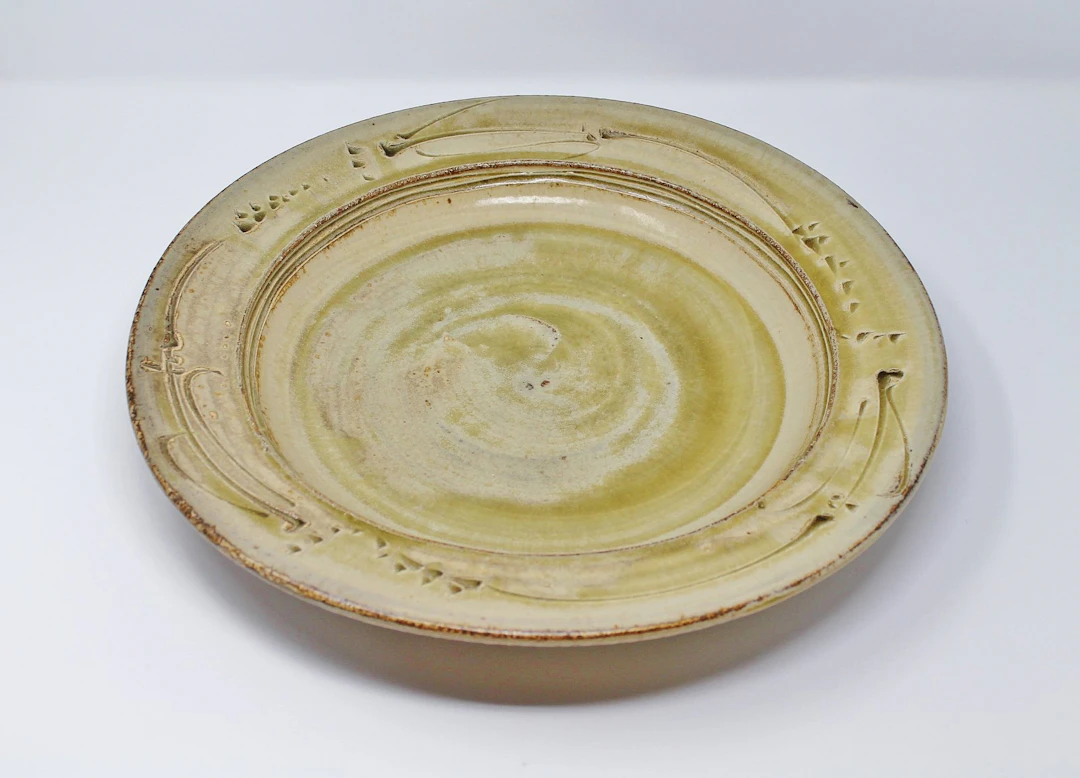 Large dish, engraved grasses, sycamore ash glaze by Jim Malone